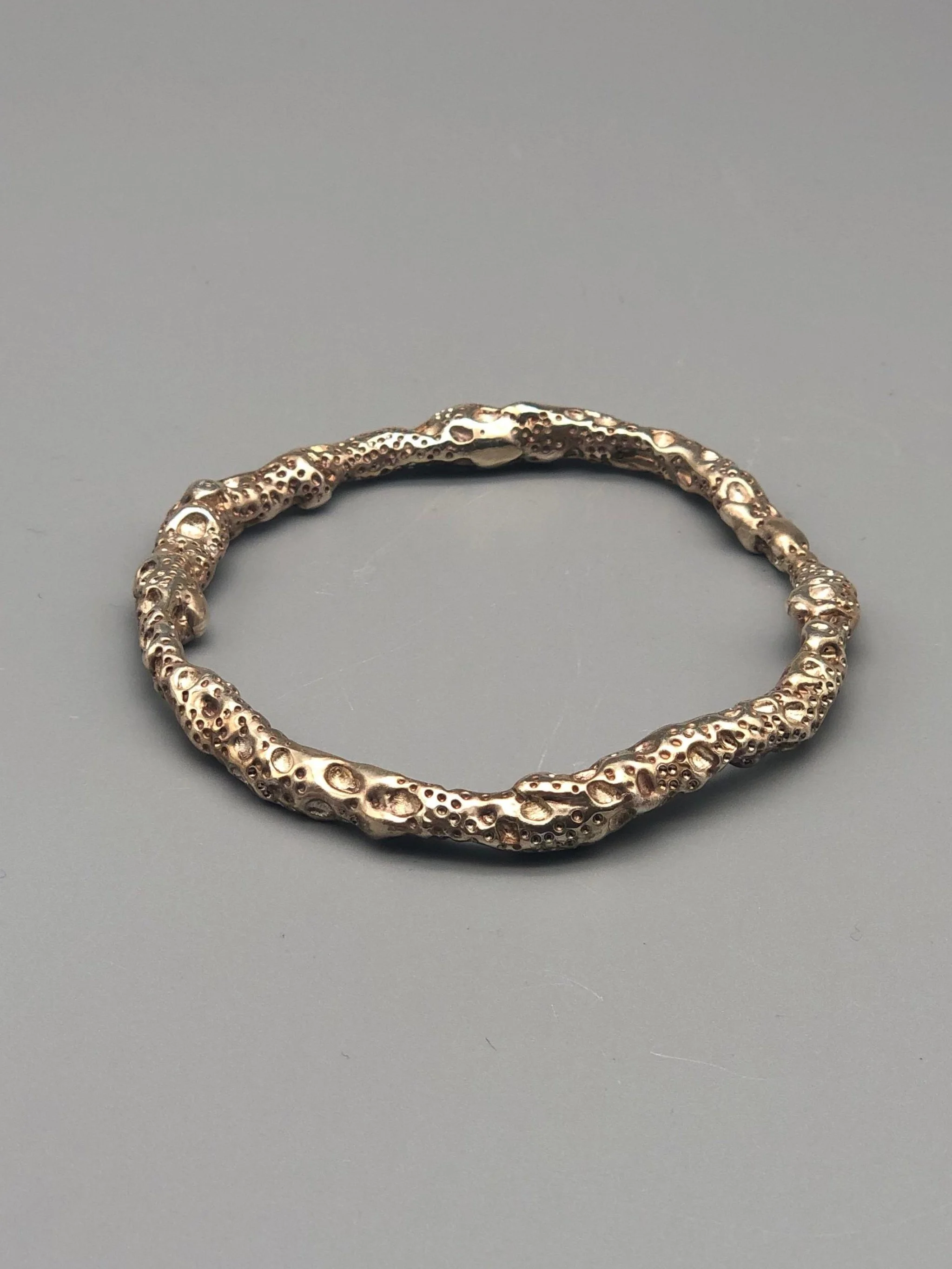 textured silver lunar surface bracelet Portas Jewels — Crepundia Bologna contemporary jewelry