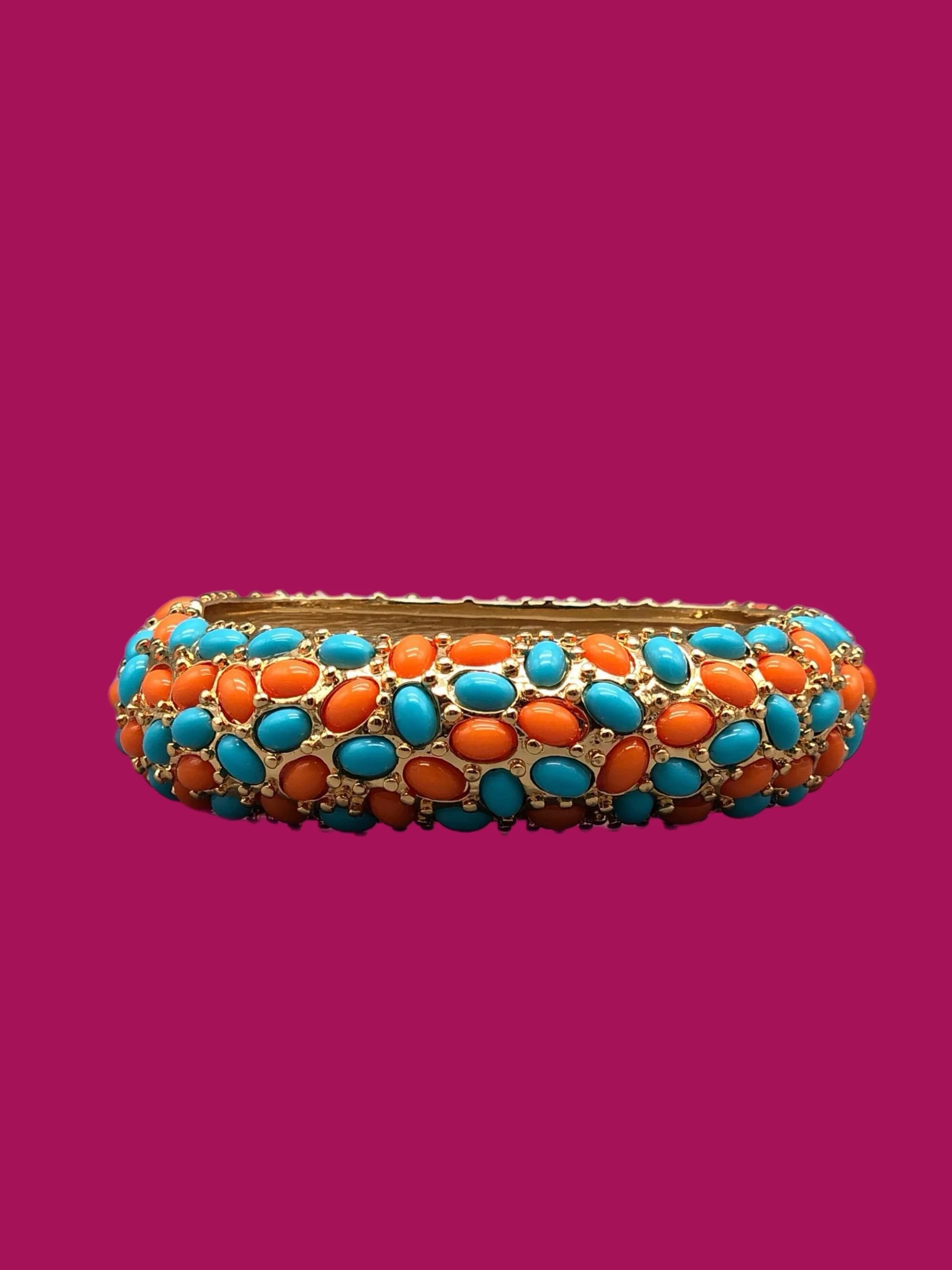 Kenneth Jay Lane costume jewelry bracelet with coral-effect elements and turquoise details, gold-tone rigid bracelet, Crepundia Gioielli Bologna