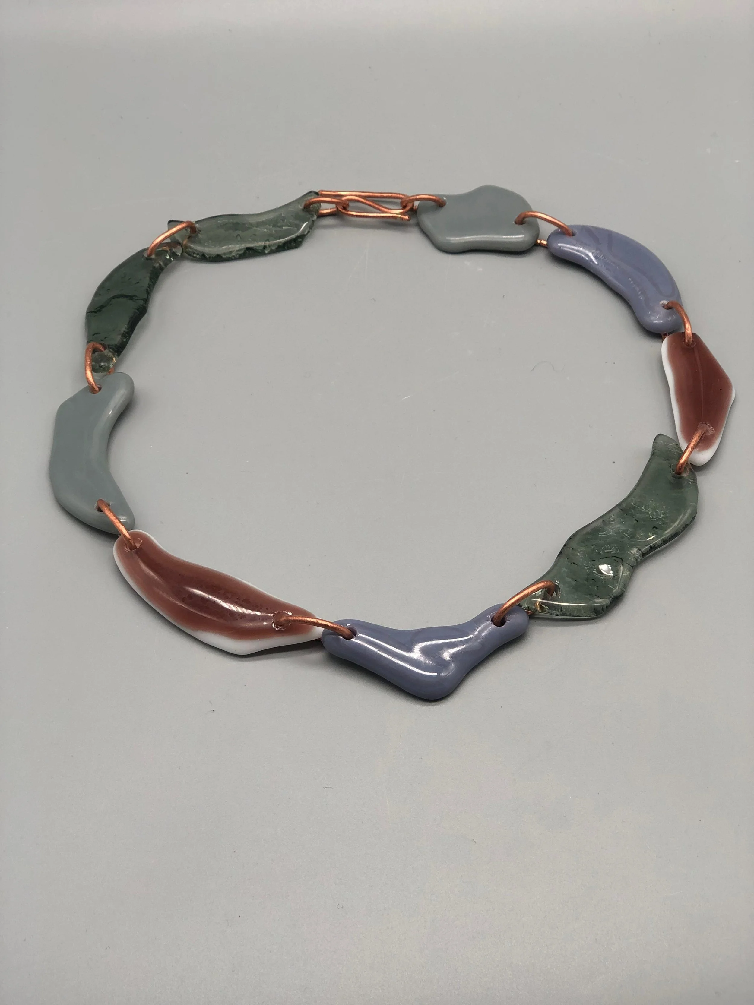 Manumara Murano glass and copper necklace for Crepundia Gioielli Bologna. / Collana Manumara in vetro Murano e rame per Crepundia Gioielli Bologna.