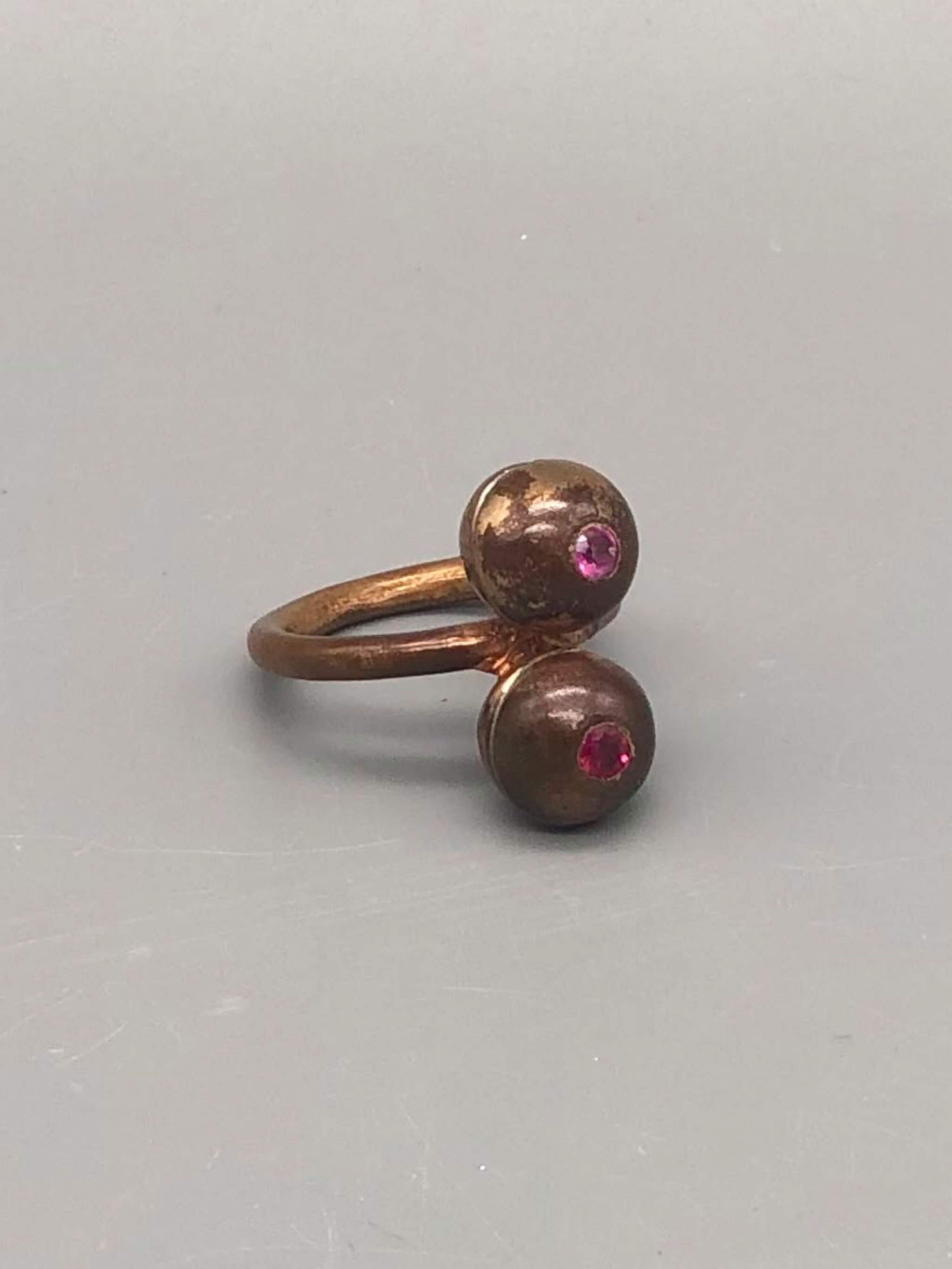 Raimondi bronze ring with ruby and pink sapphire.