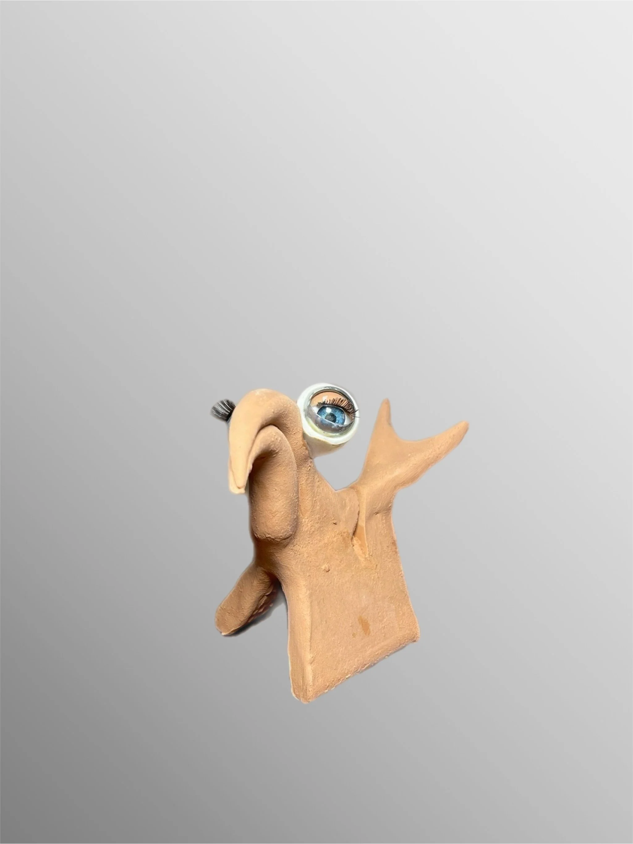 Paolo Anselmo terracotta place card holder with applied eye element, anthropomorphic sculptural object — Crepundia Gioielli Bologna