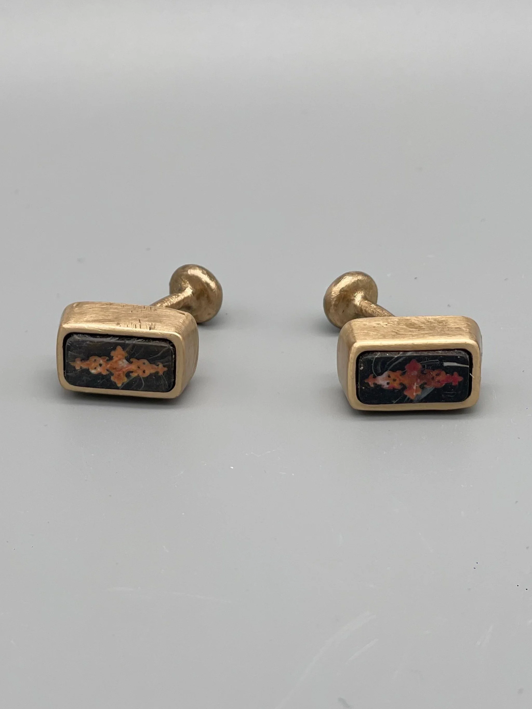CōDICEDS cufflinks in bronze with polymer clay and Omonoia element, Crepundia Gioielli Bologna