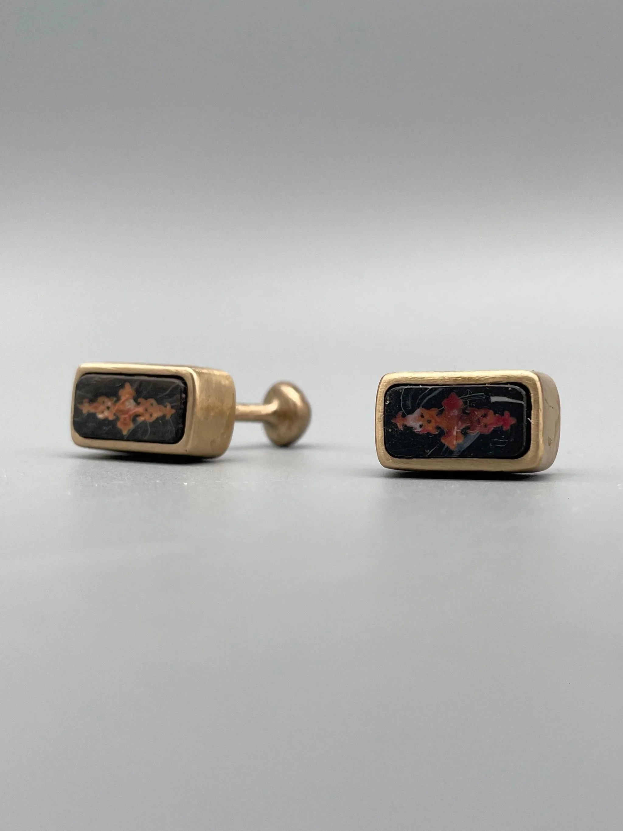 CōDICEDS cufflinks in bronze with polymer clay and Omonoia element, Crepundia Gioielli Bologna