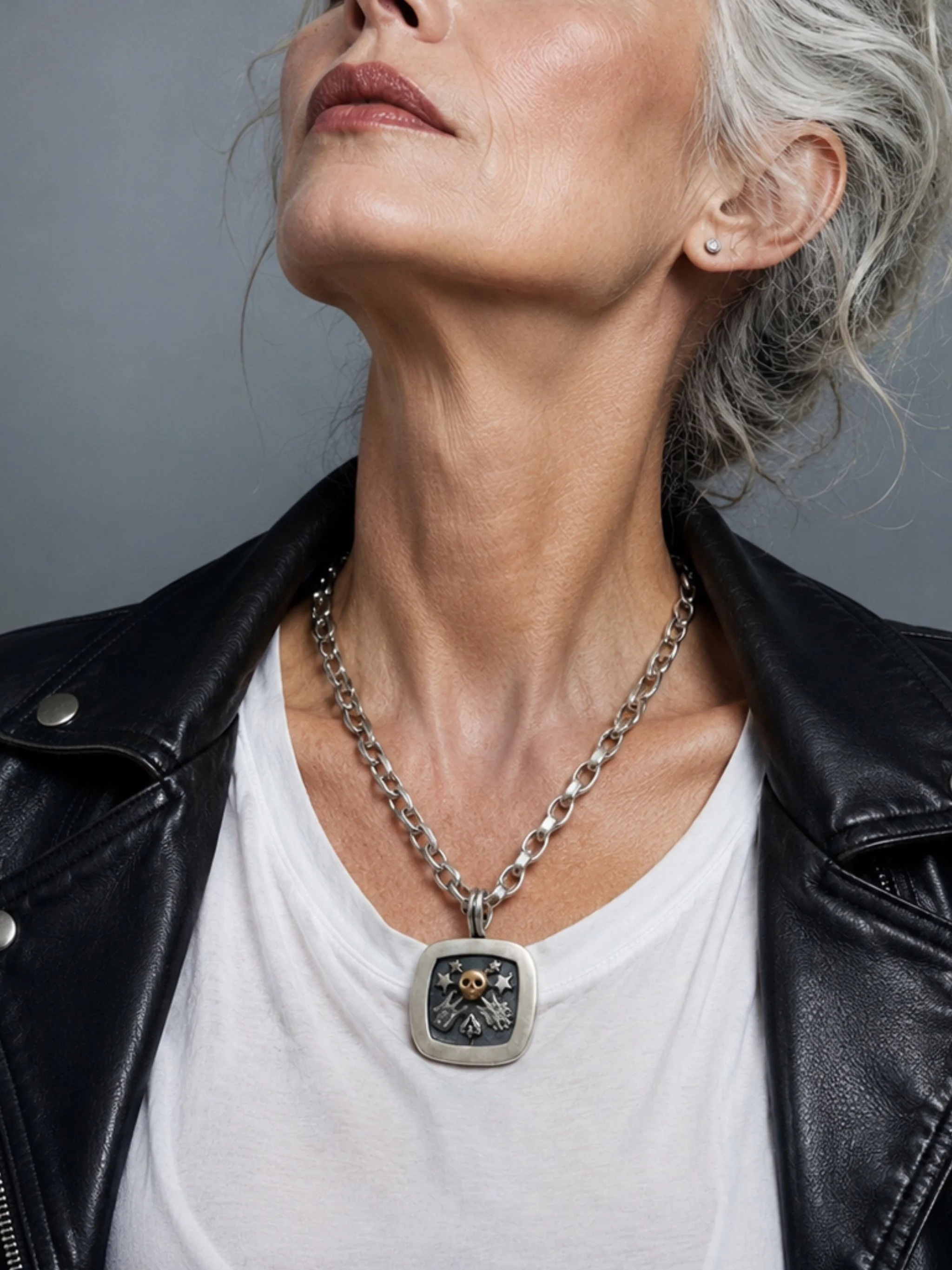 Sonja Markhoff The Ace of Spades Tribute to Rock necklace in sterling silver and 18 kt rose gold for Crepundia Gioielli Bologna.