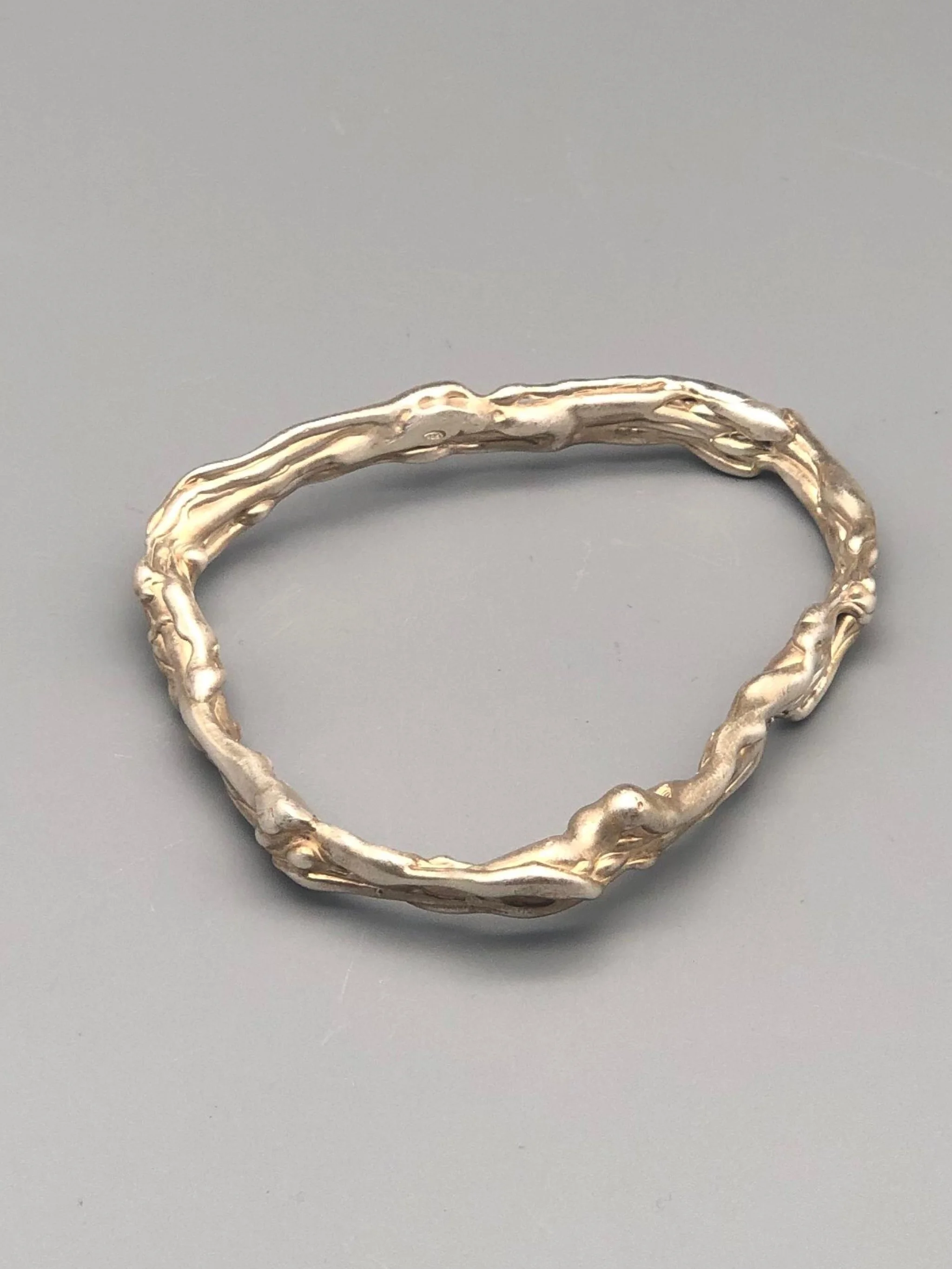 textured silver halo bracelet detail Portas Jewels — Crepundia Bologna sculptural jewelry