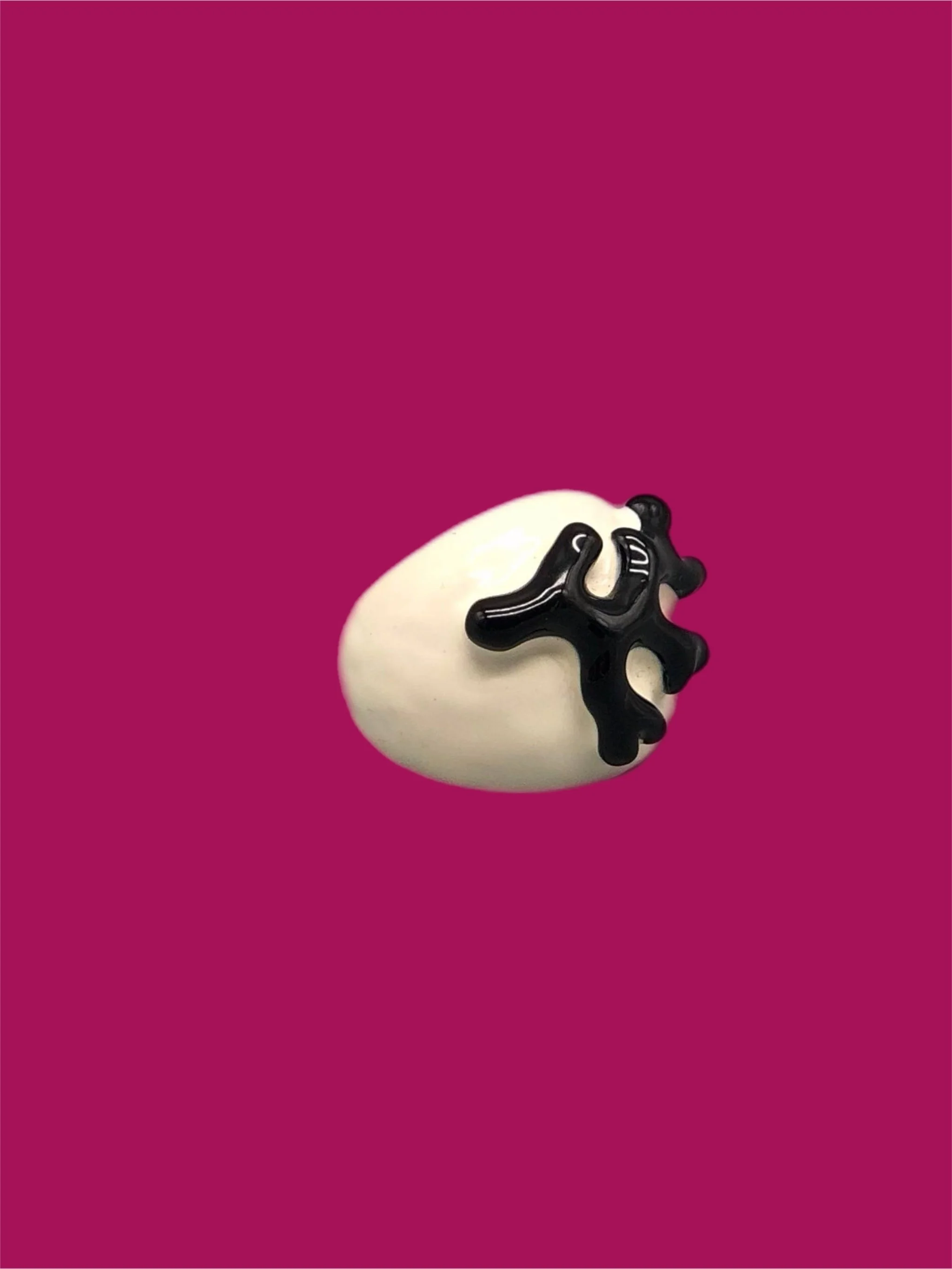 Kenneth Jay Lane costume jewelry, gold-tone ring with white enamel and raised black element, Crepundia Gioielli Bologna