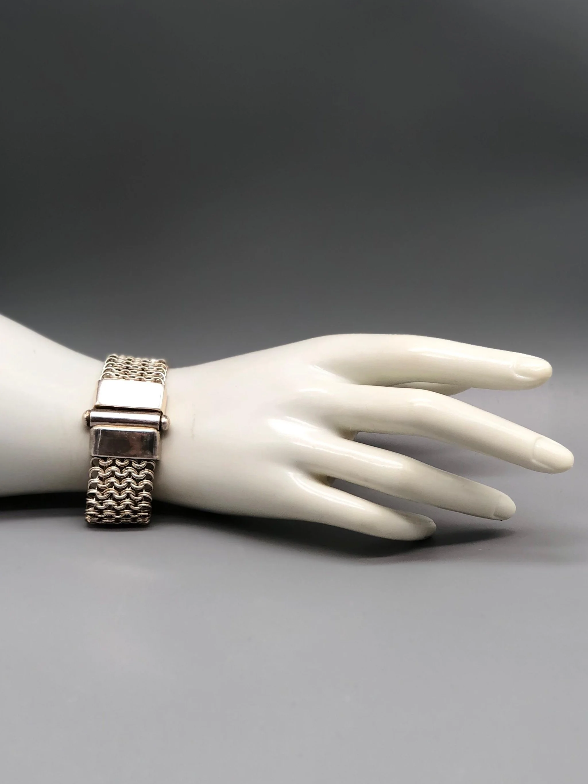 Double Chain Bracelet by Ariadna Segafredo for Crepundia Gioielli in sterling silver, wide woven chain texture and geometric clasp
