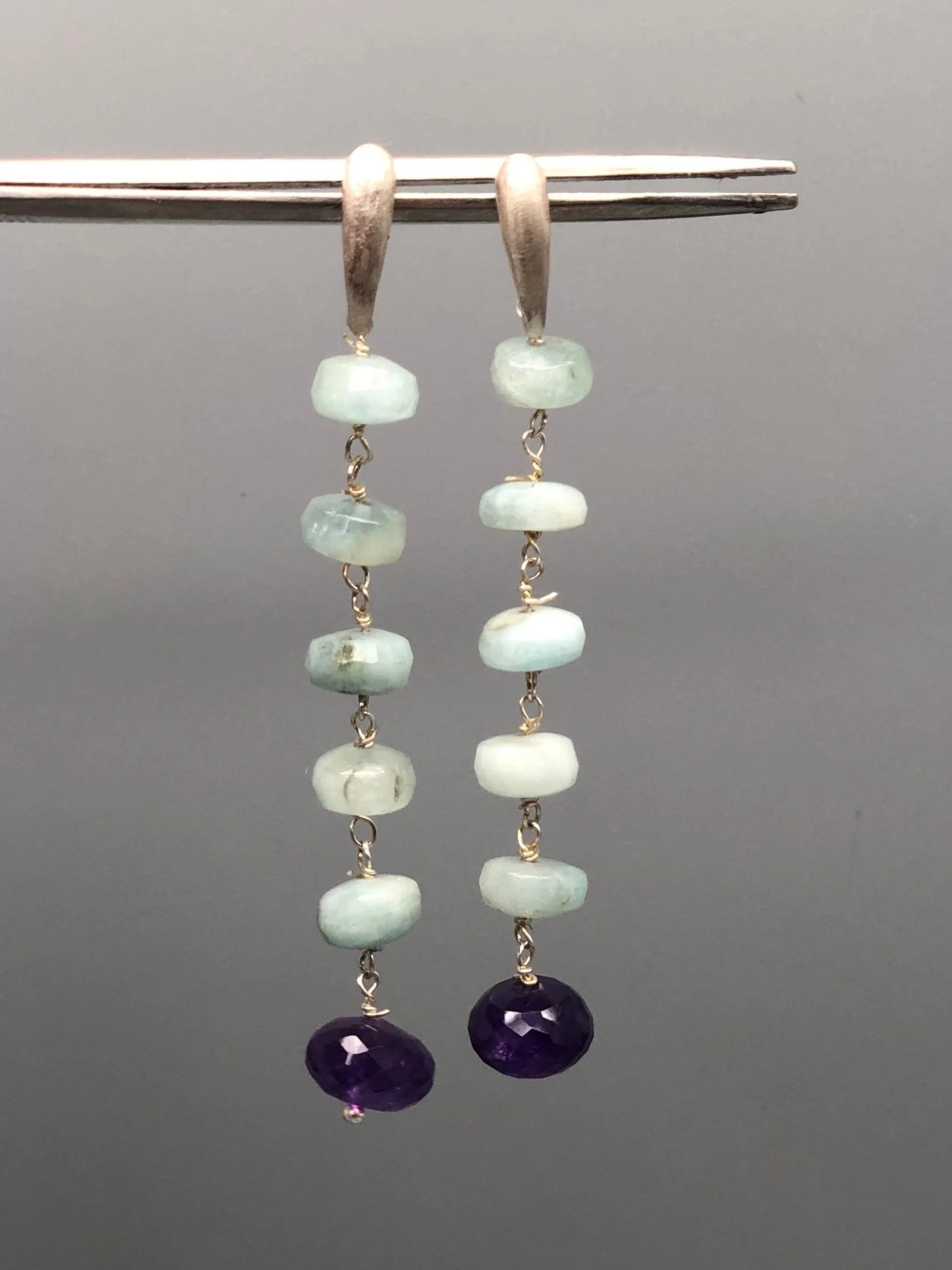 Still Drops 11 earrings by Crepundia Gioielli Bologna in matte sterling silver with milky aquamarine and amethyst gemstones