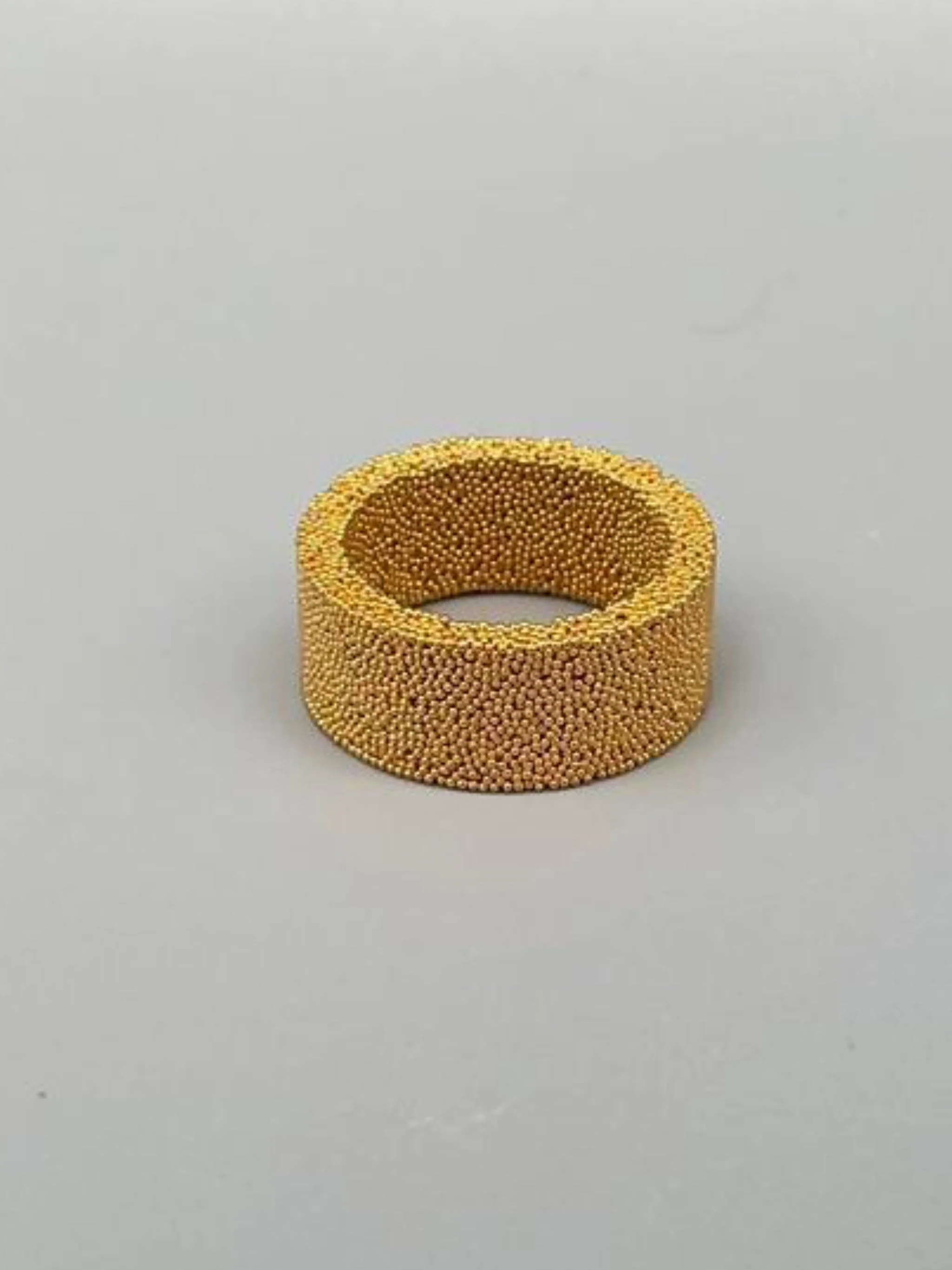 Contemporary ring in sintered bronze by Francesca Valpiani, Crepundia Gioielli Bologna