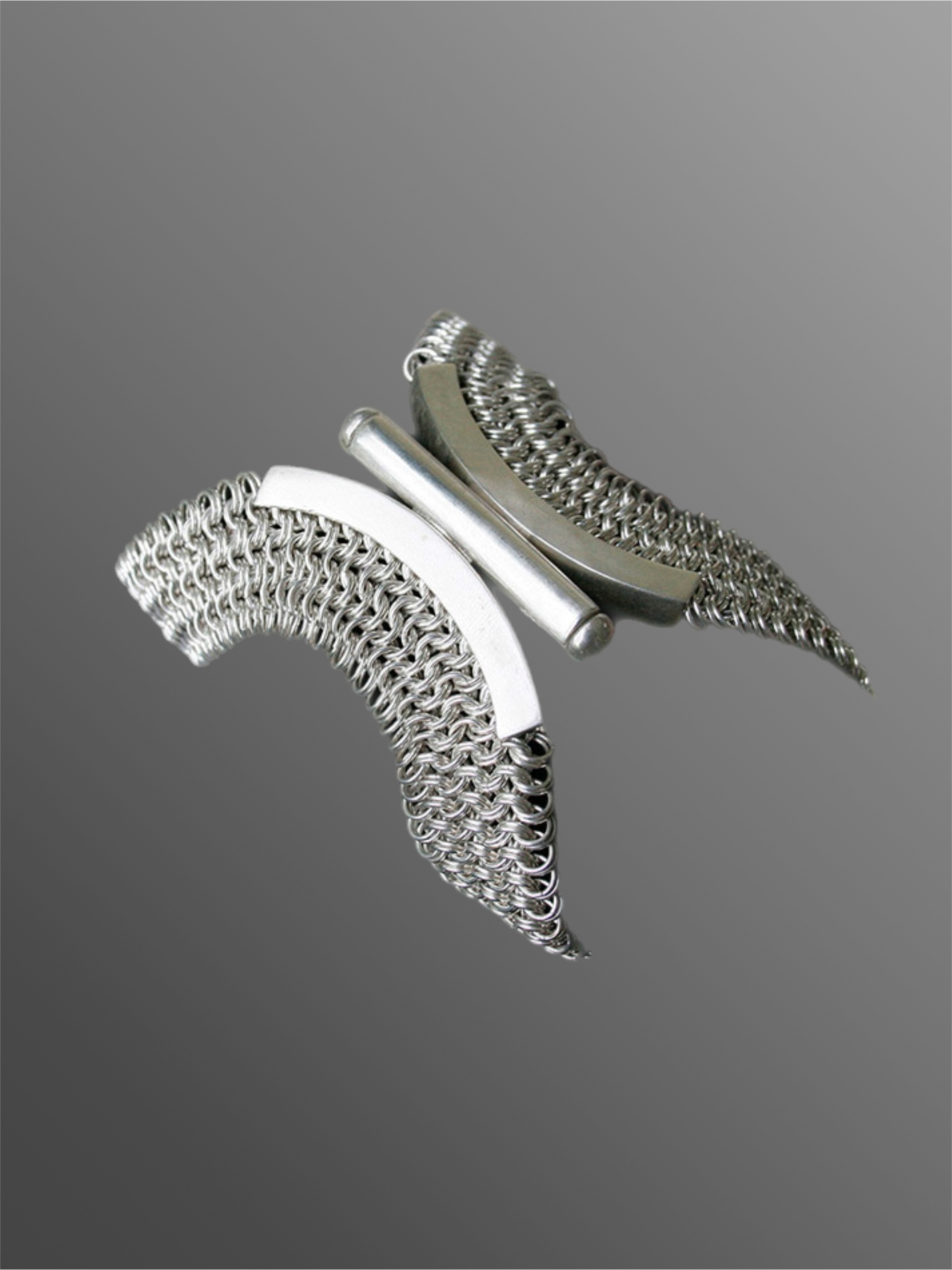 Sterling silver sculptural bracelet by Ariadna Segafredo for Crepundia Gioielli Bologna, wide woven chain with rigid elements, contemporary statement piece