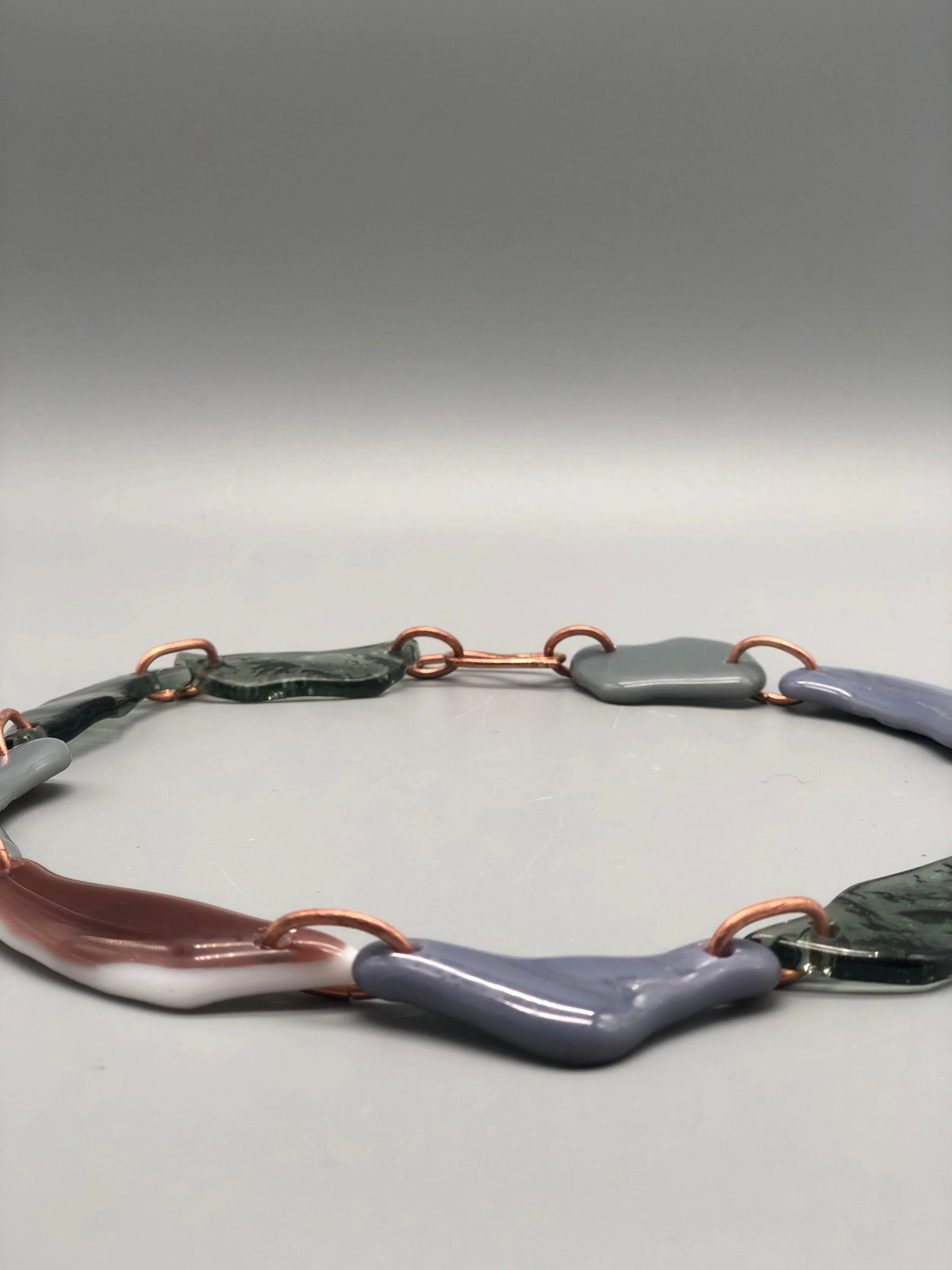 Manumara Murano glass and copper necklace for Crepundia Gioielli Bologna. / Collana Manumara in vetro Murano e rame per Crepundia Gioielli Bologna.