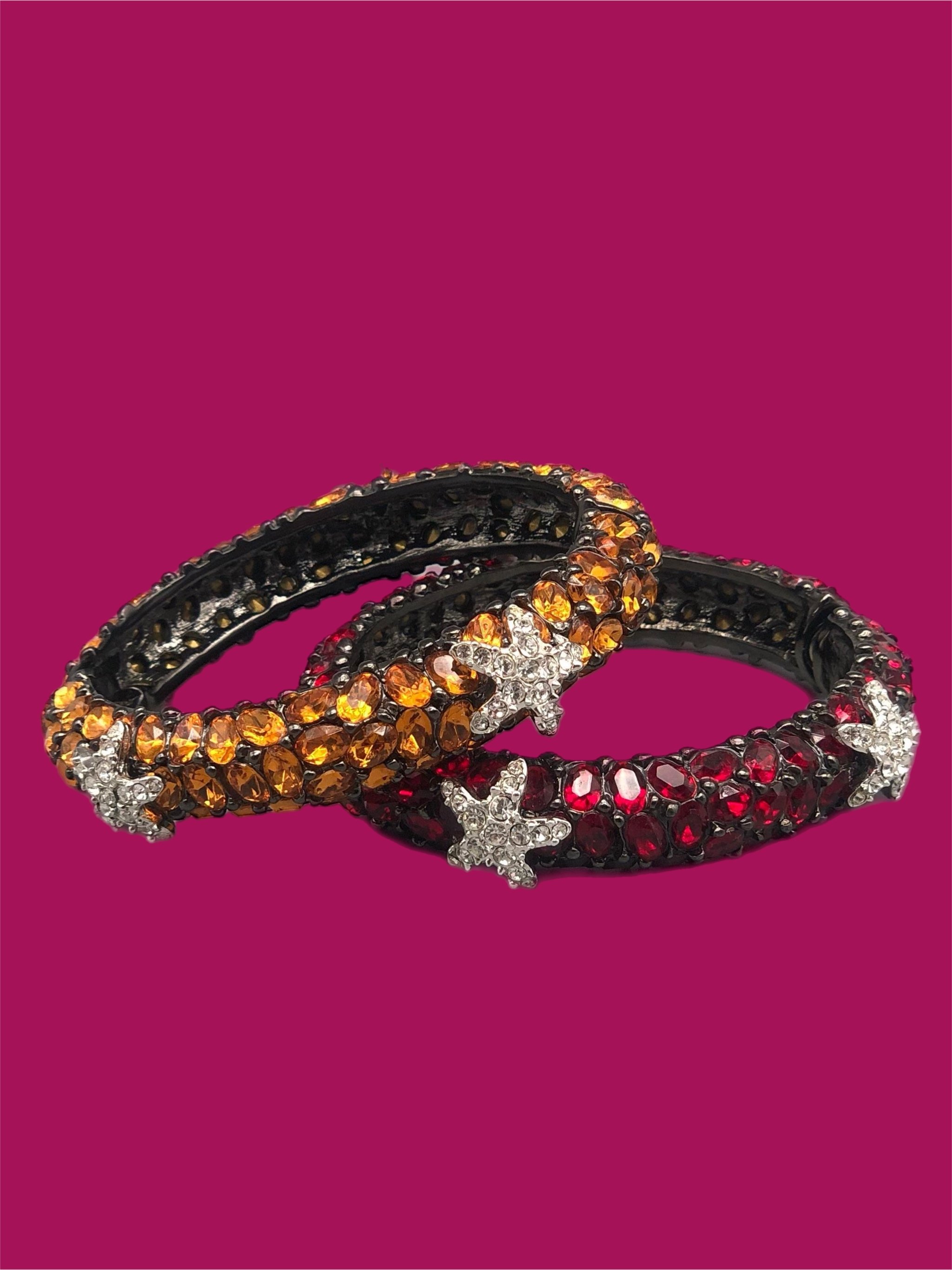 Kenneth Jay Lane costume jewelry bracelet with amber-colored crystals and starfish details, gold-tone rigid bracelet, Crepundia Gioielli Bologna