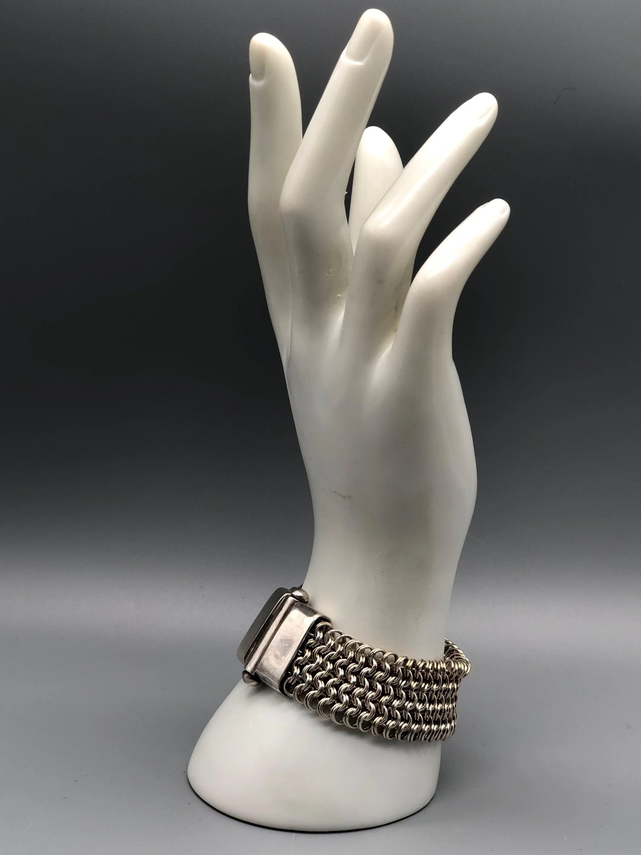 Double Chain Bracelet by Ariadna Segafredo for Crepundia Gioielli in sterling silver, wide woven chain texture and geometric clasp