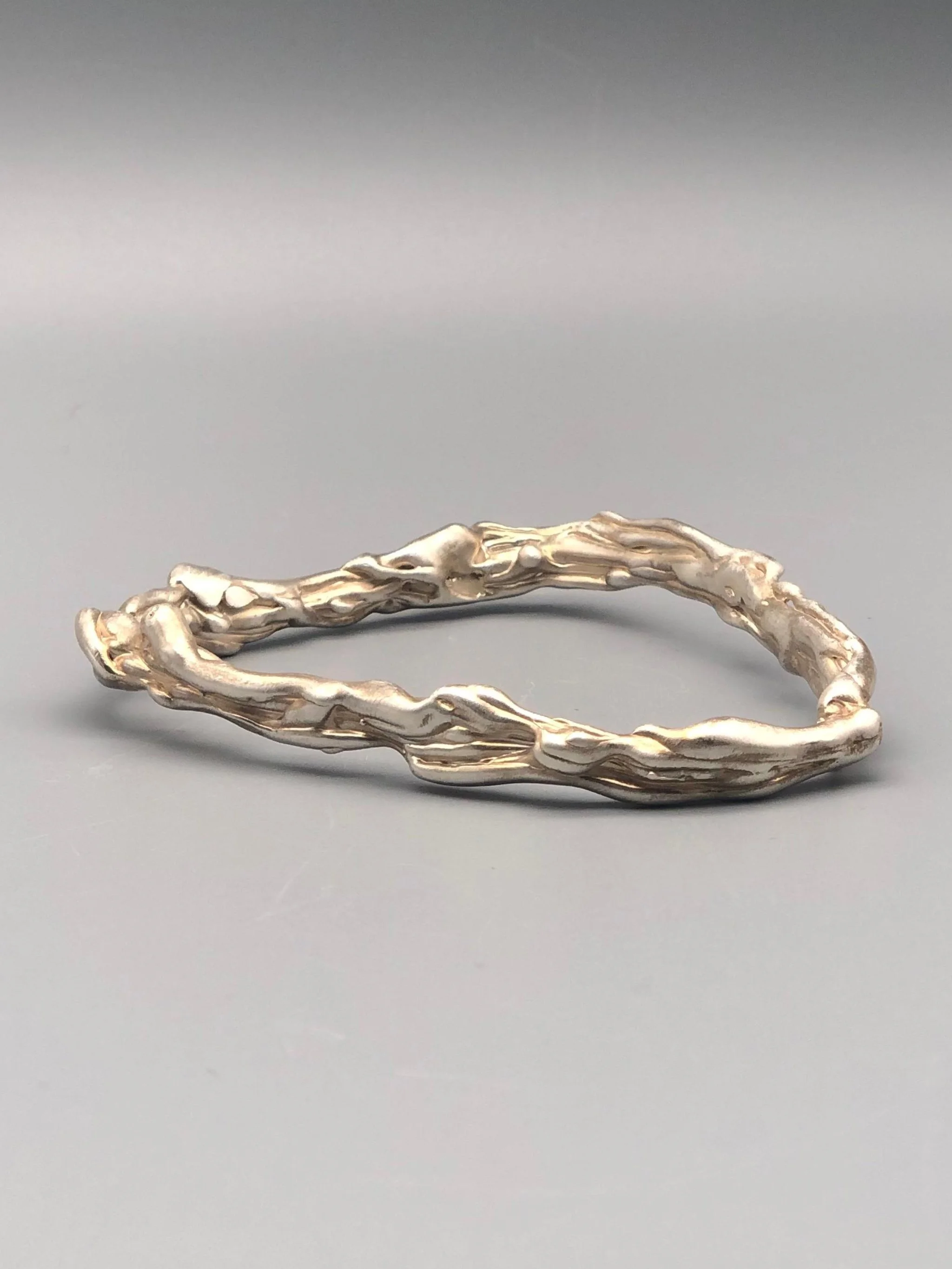 textured silver halo bracelet detail Portas Jewels — Crepundia Bologna sculptural jewelry