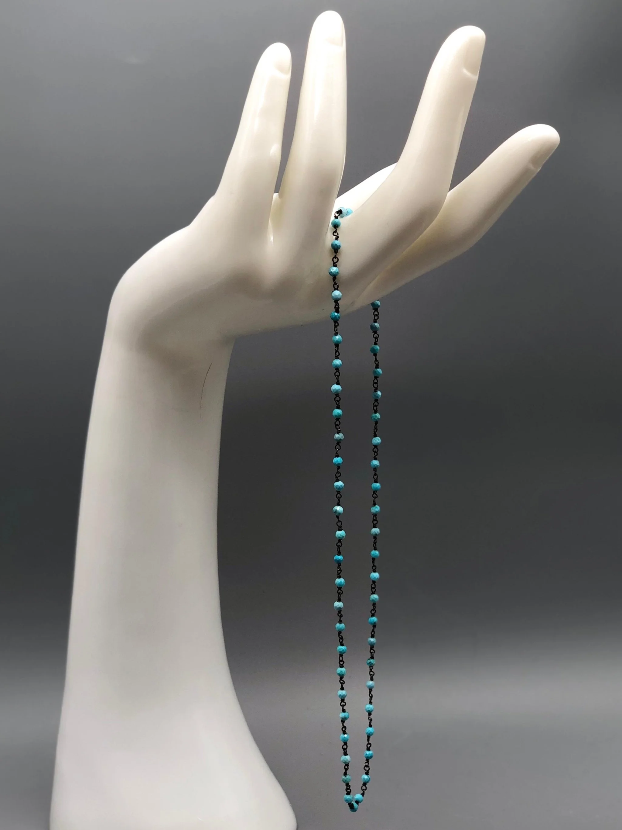 Turquoise rosary necklace in oxidized sterling silver by Crepundia Gioielli Bologna. / Collana rosario in turchese e argento brunito Crepundia Gioielli Bologna.