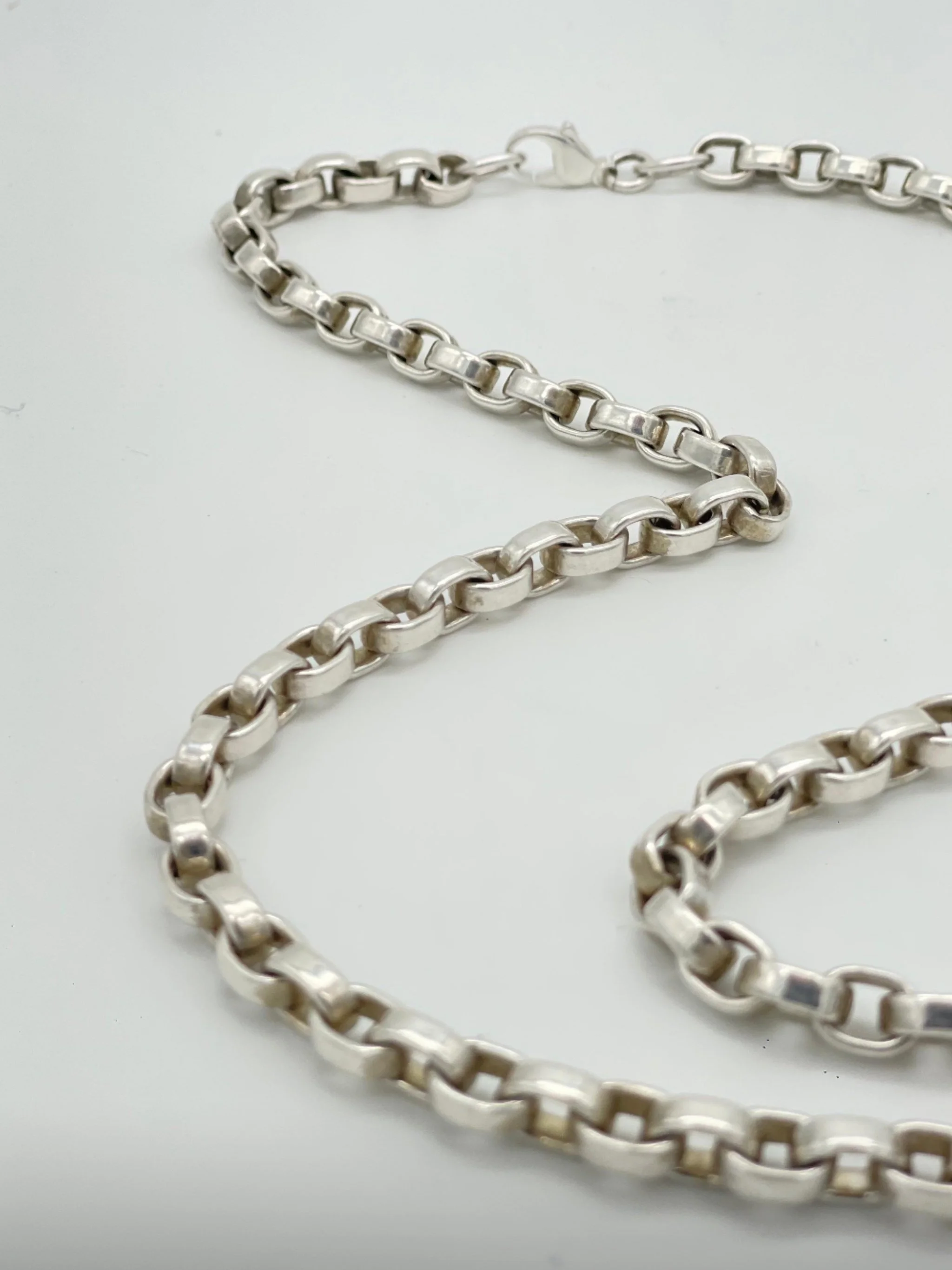 Sonja Markhoff The Ace of Spades Tribute to Rock necklace in sterling silver and 18 kt rose gold for Crepundia Gioielli Bologna.