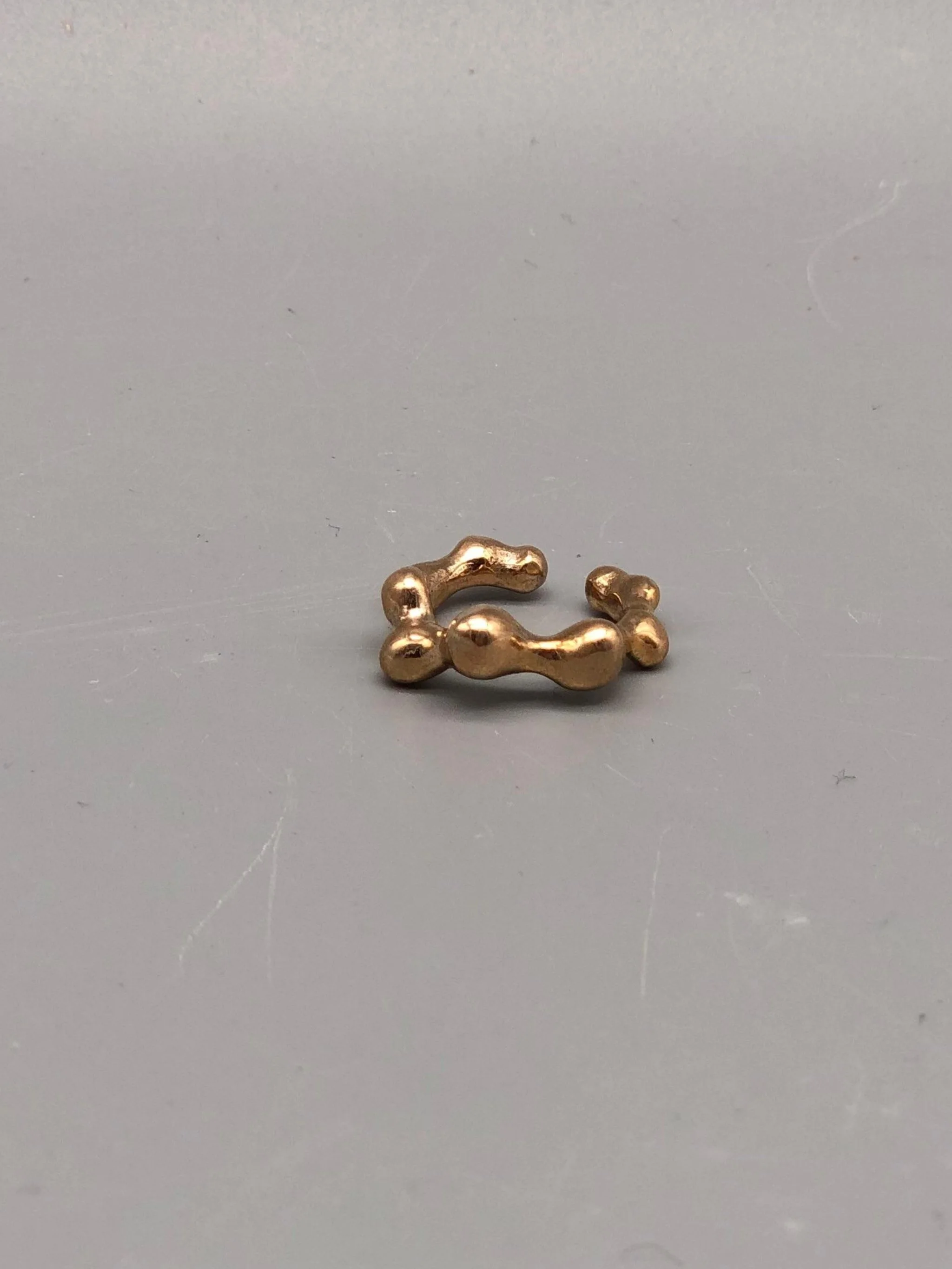 Ear Cuff in Bronzo
Bronze Ear Cuff

Floret Gioielli per Crepundia Gioielli Bologna
Floret Jewelry at Crepundia Gioielli Bologna