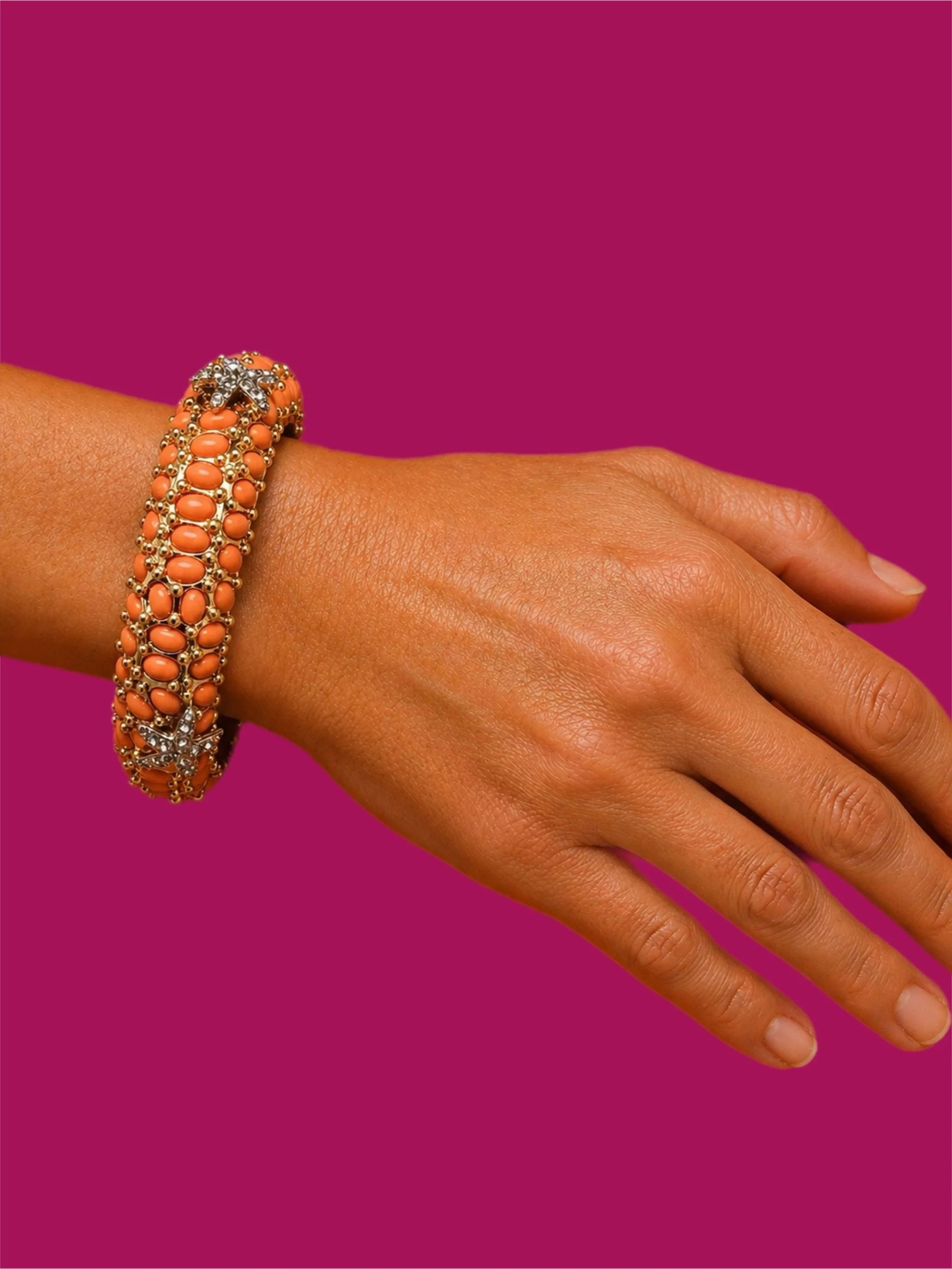 Kenneth Jay Lane gold-tone rigid bracelet with orange cabochons and crystal details, costume jewelry, Crepundia Gioielli Bologna