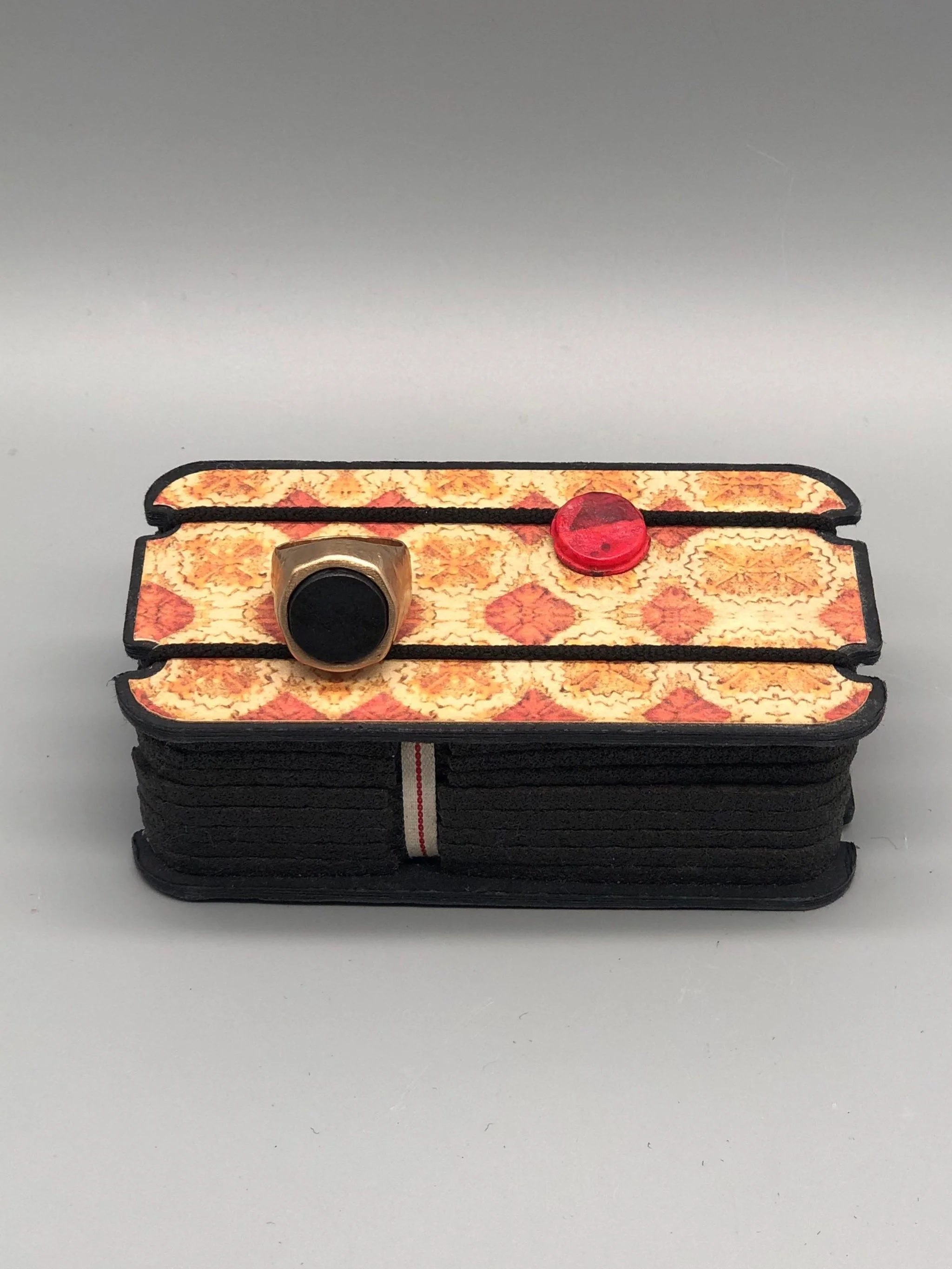 CōDICEDS bronze ring with raw silver interwoven motif and marble, Crepundia Gioielli Bologna