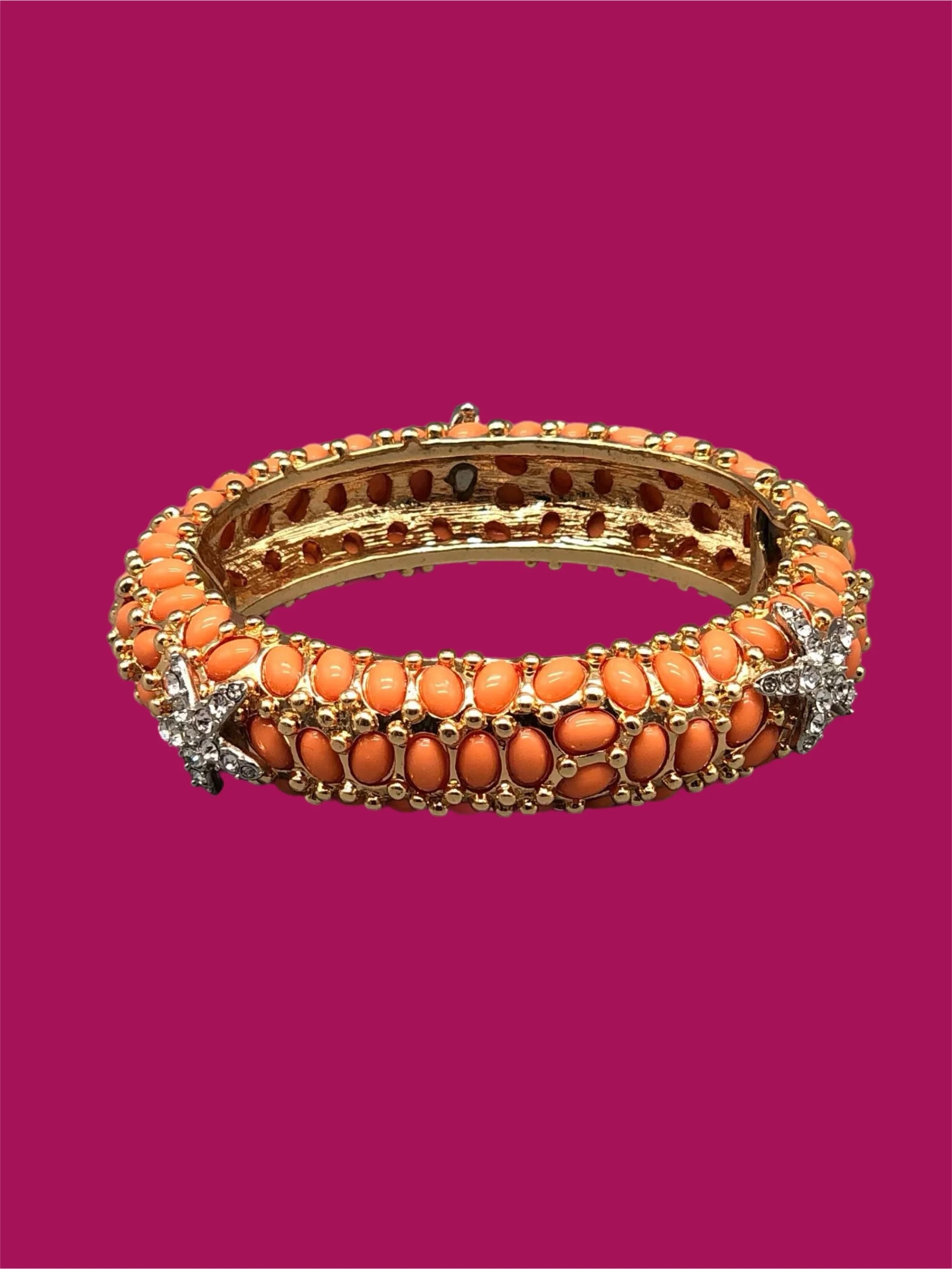 Kenneth Jay Lane gold-tone bracelet with orange cabochons and crystal details, costume jewelry, Crepundia Gioielli Bologna
Bracciale Kenneth Jay Lane dorato con cabochon arancioni e dettagli in cristallo, costume jewelry, Crepundia Gioielli Bologna