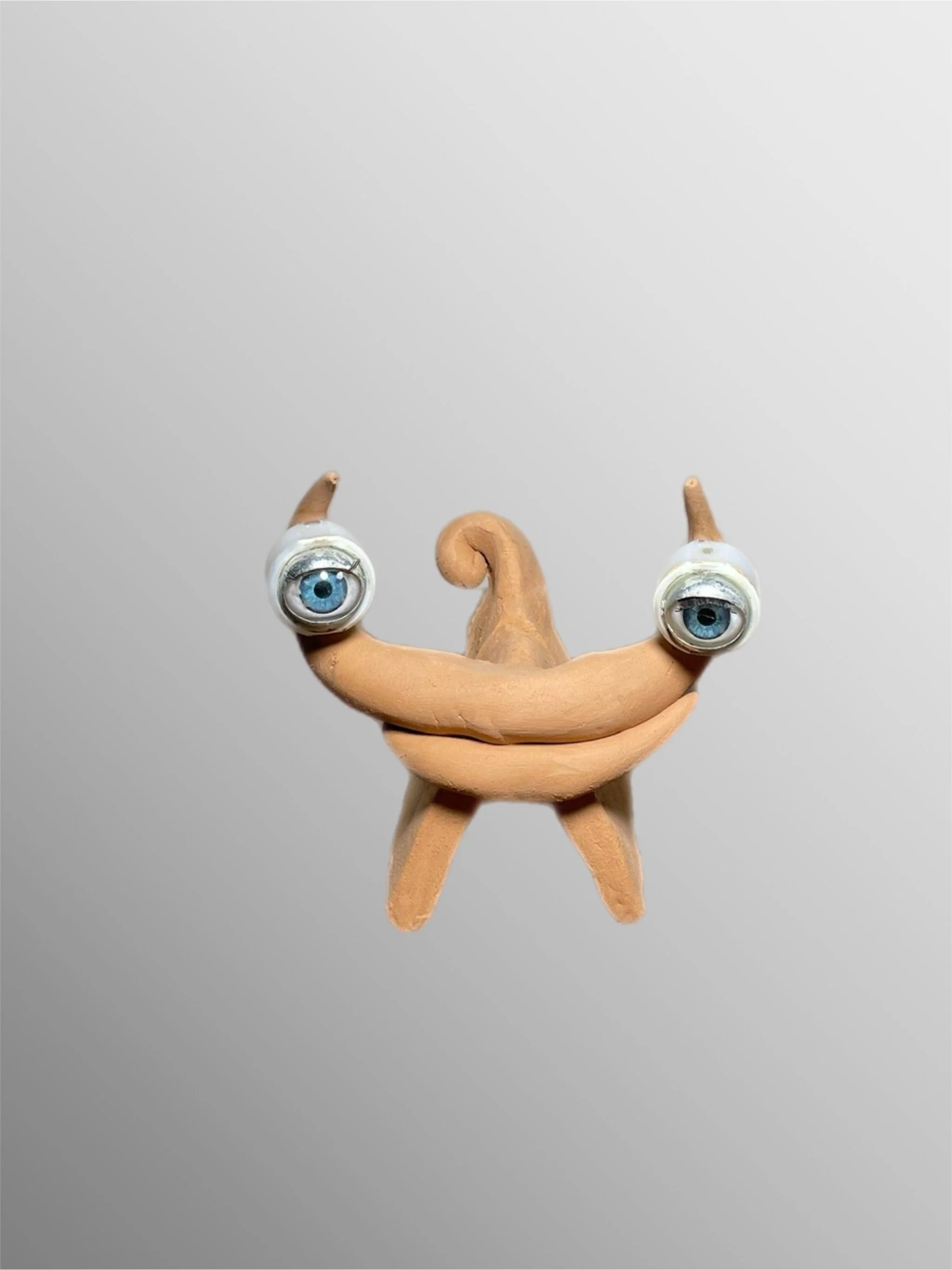 Paolo Anselmo terracotta place card holder with applied eye element, anthropomorphic sculptural object — Crepundia Gioielli Bologna