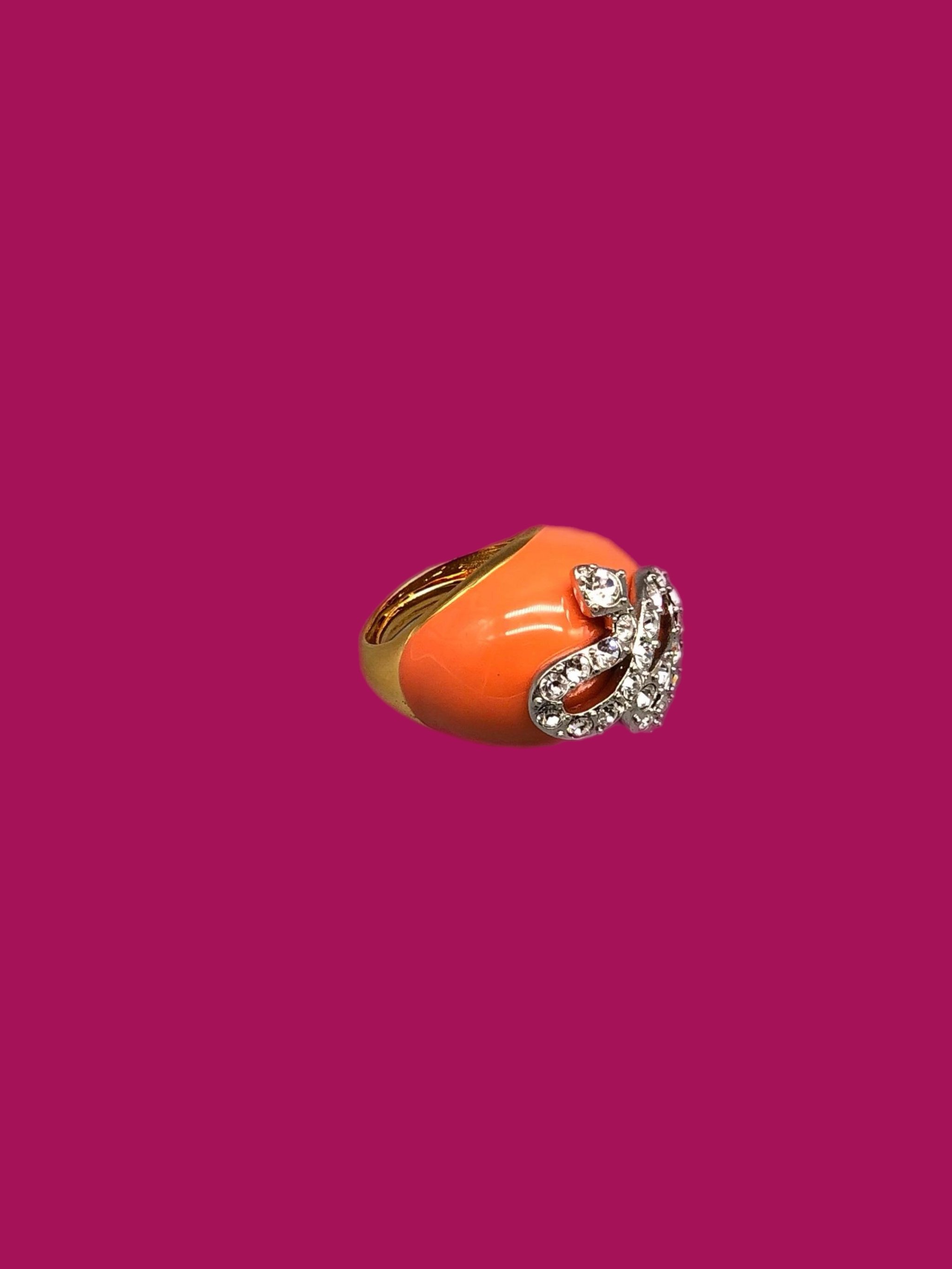 Kenneth Jay Lane costume jewelry ring with coral-effect resin and crystal snake detail, gold-tone ring, Crepundia Gioielli Bologna