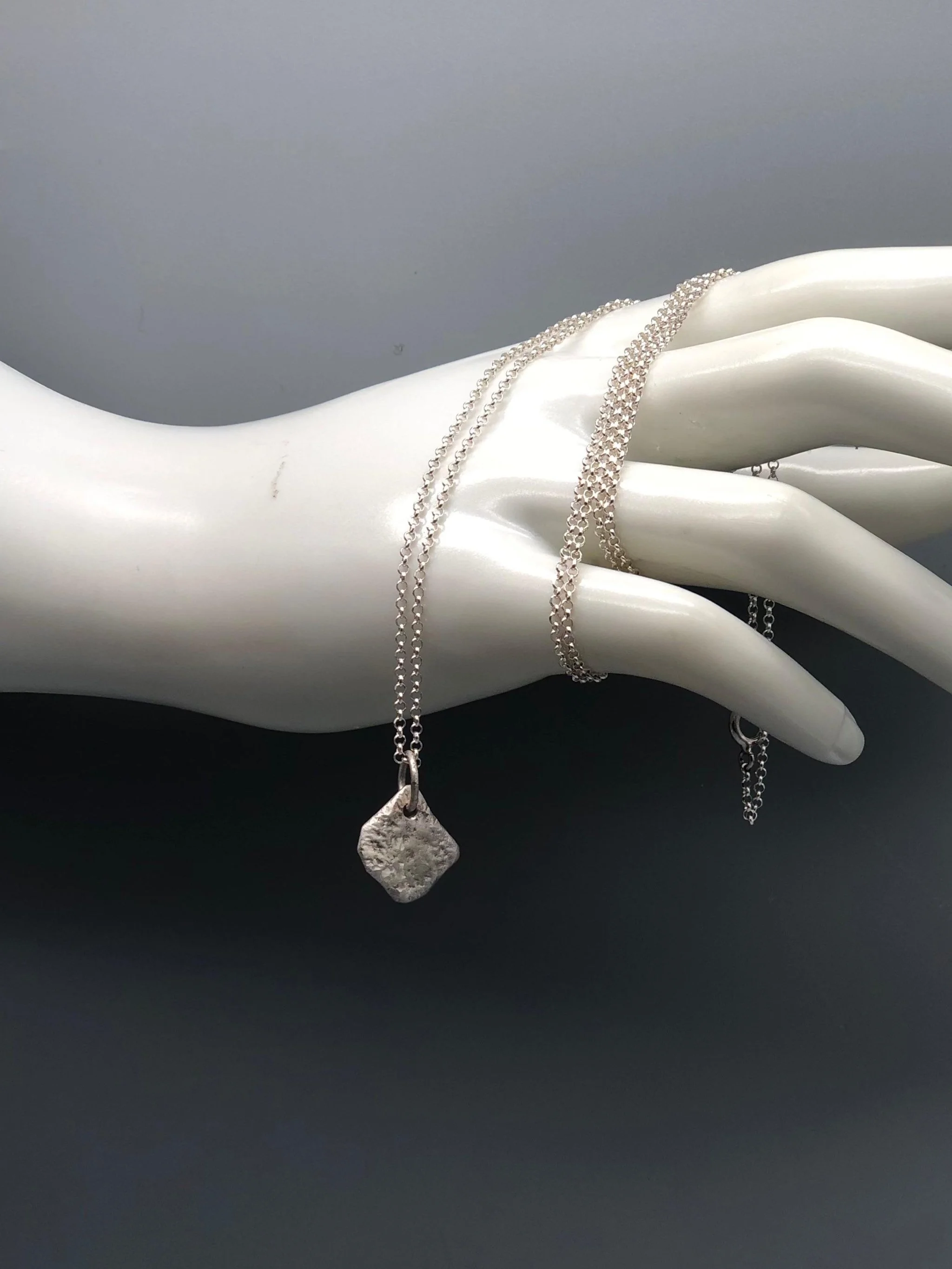 Essentia Fragment pendant in hammered sterling silver on chain — Crepundia Gioielli — Crepundia Bologna