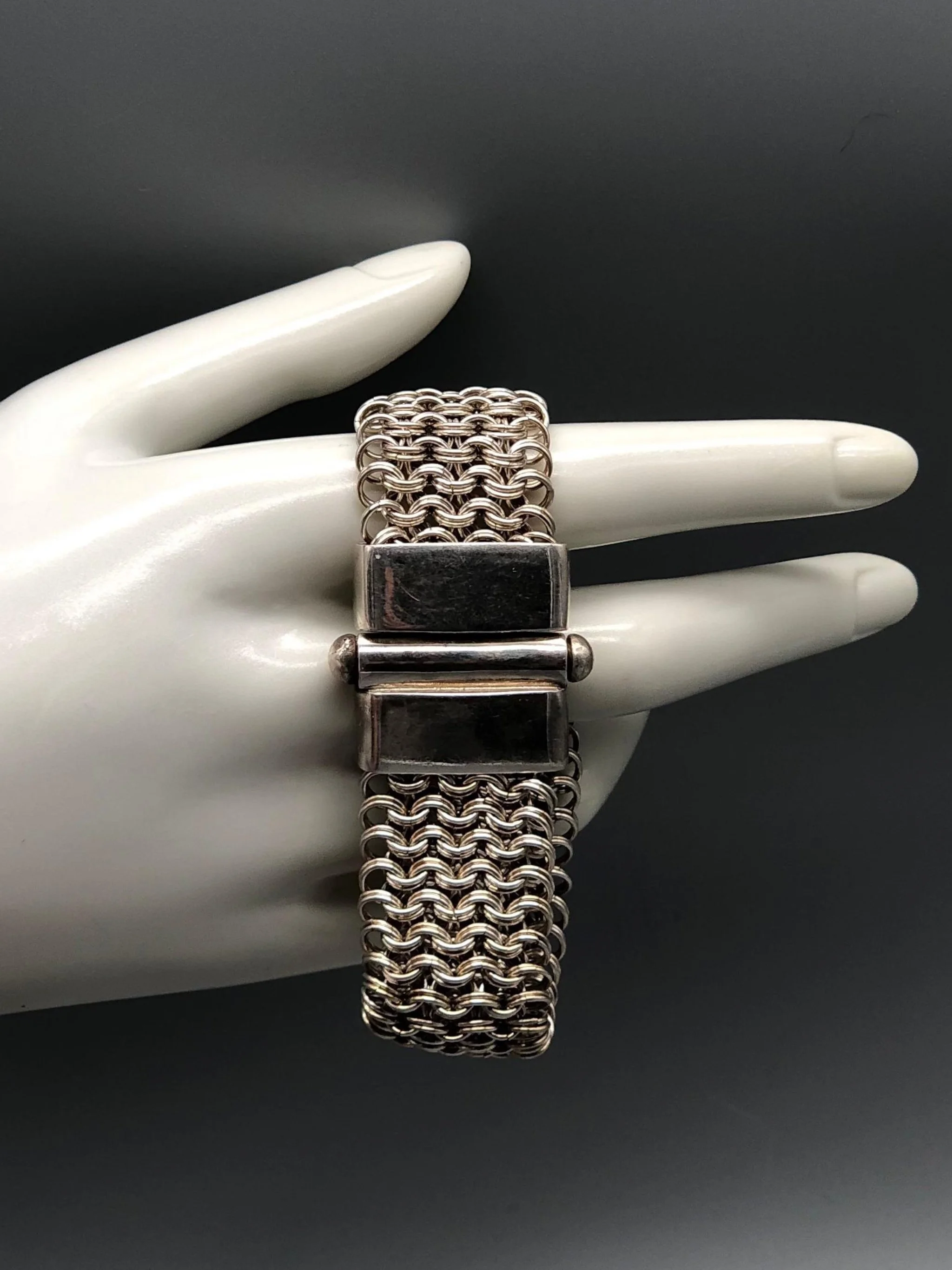 Double Chain Bracelet by Ariadna Segafredo for Crepundia Gioielli in sterling silver, wide woven chain texture and geometric clasp