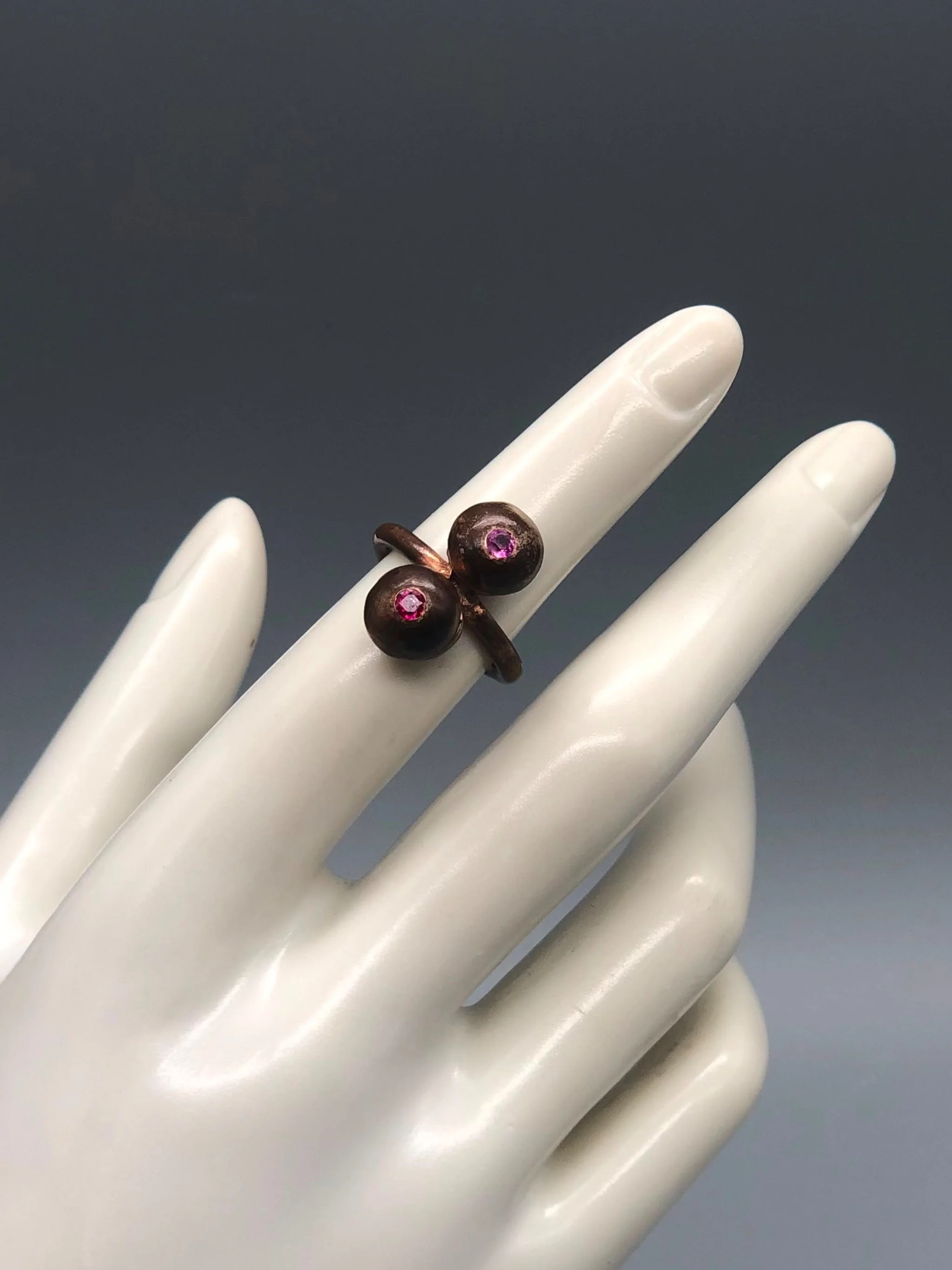 Raimondi bronze ring with ruby and pink sapphire.