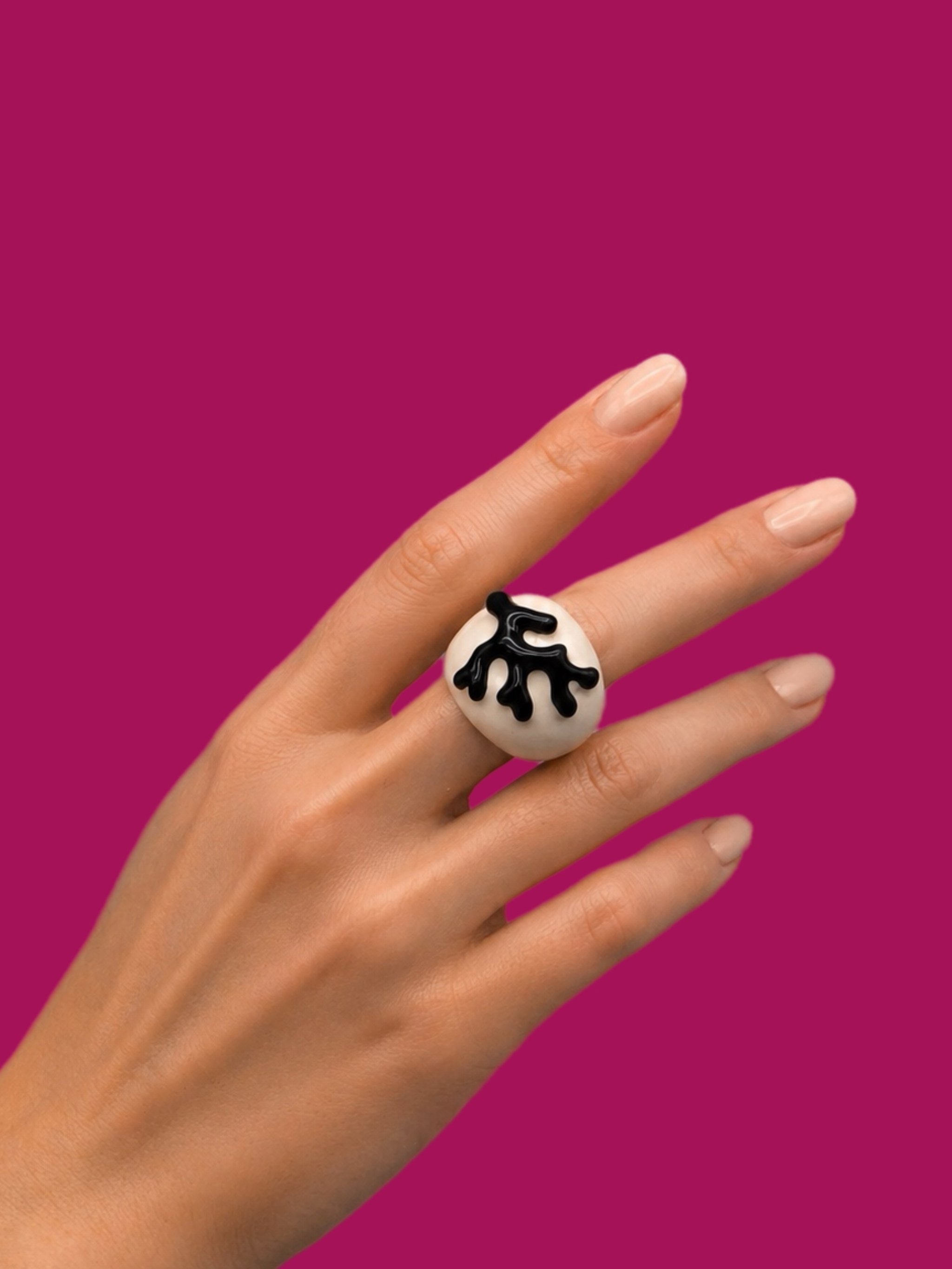Kenneth Jay Lane costume jewelry, gold-tone ring with white enamel and raised black element, Crepundia Gioielli Bologna