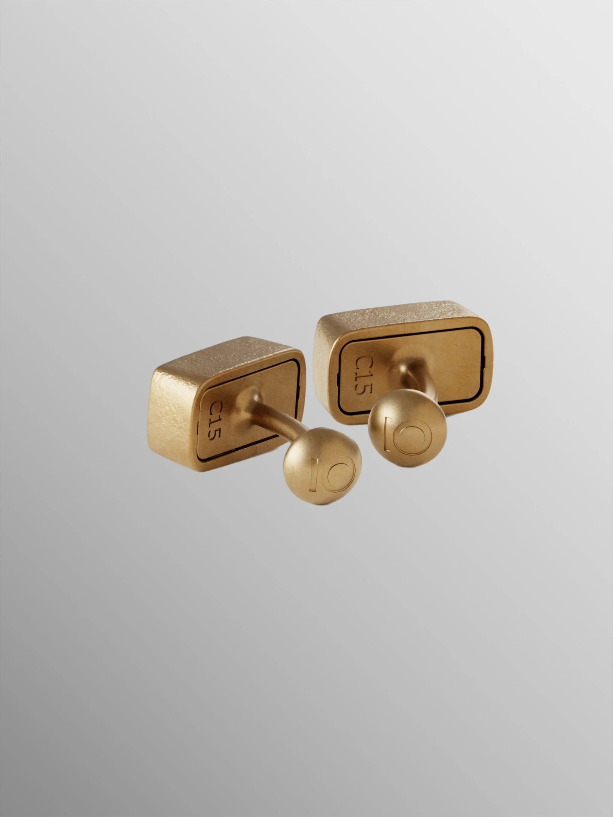 CōDICEDS cufflinks in bronze with polymer clay and Omonoia element, Crepundia Gioielli Bologna