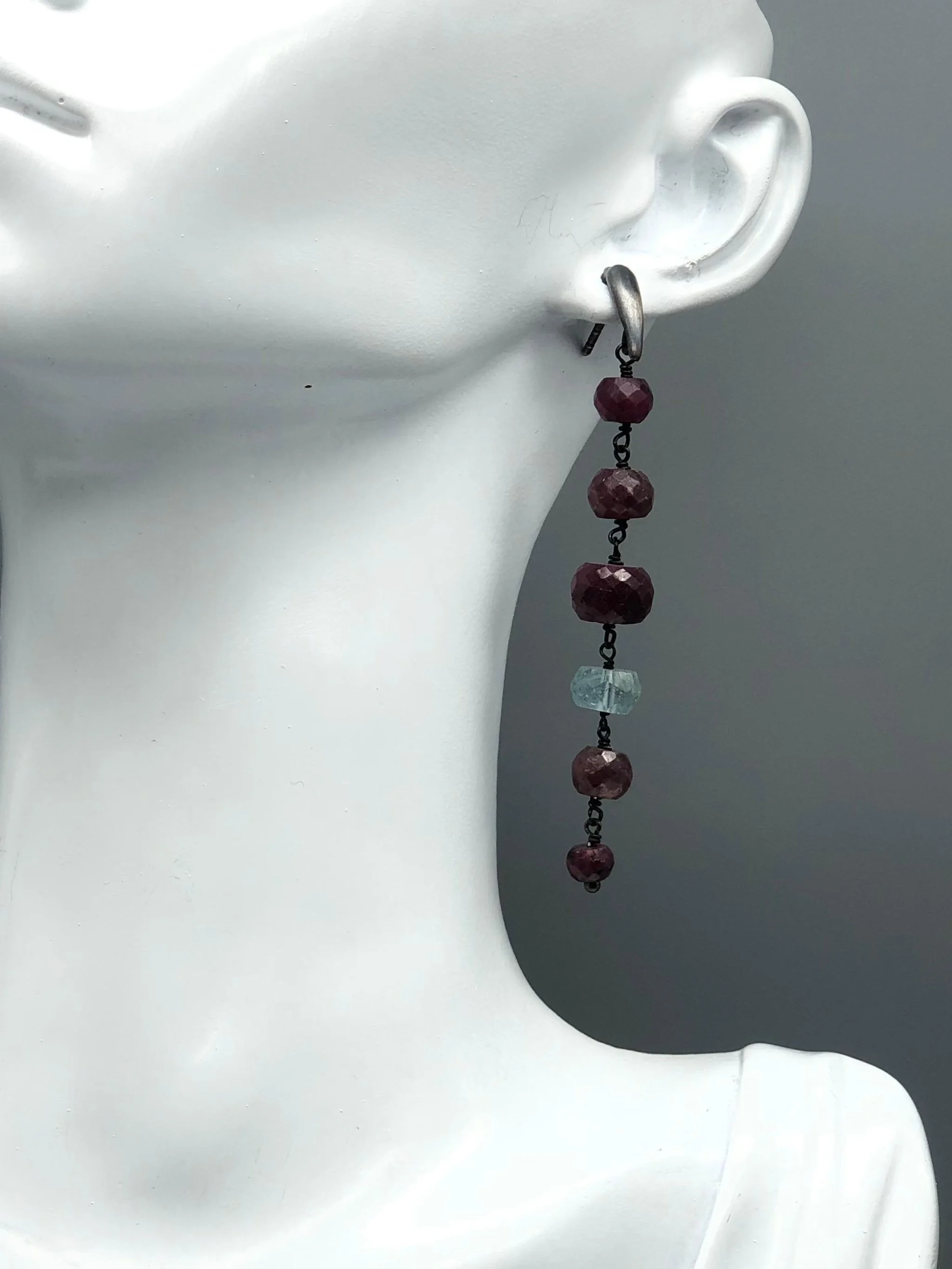 Still Drops 45 earrings by Crepundia Gioielli Bologna in oxidized sterling silver with ruby root and aquamarine gemstones