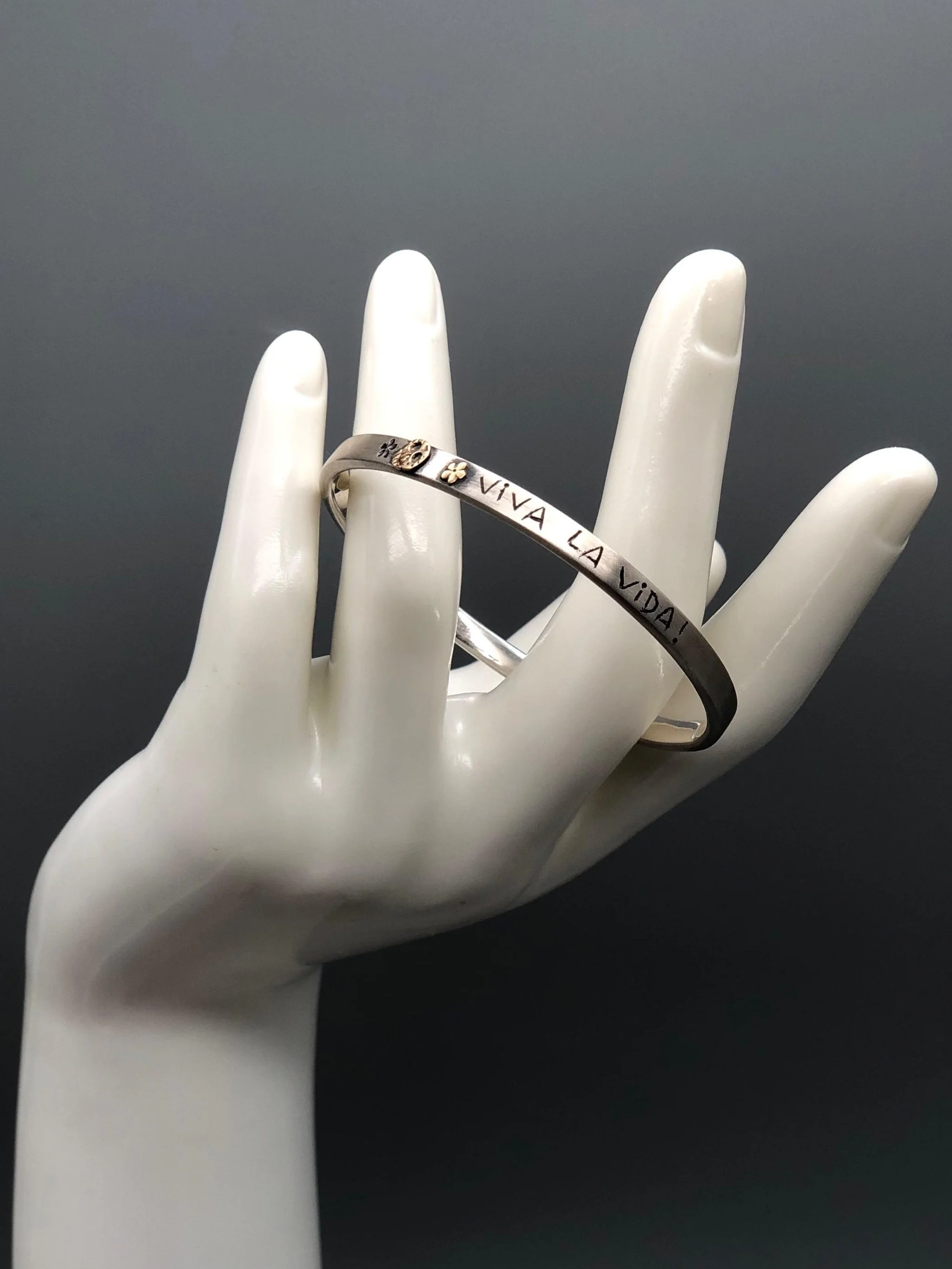 VIVA LA VIDA bracelet by Sonja Markhoff in sterling silver with 18 kt gold sugar skull detail and engraved message