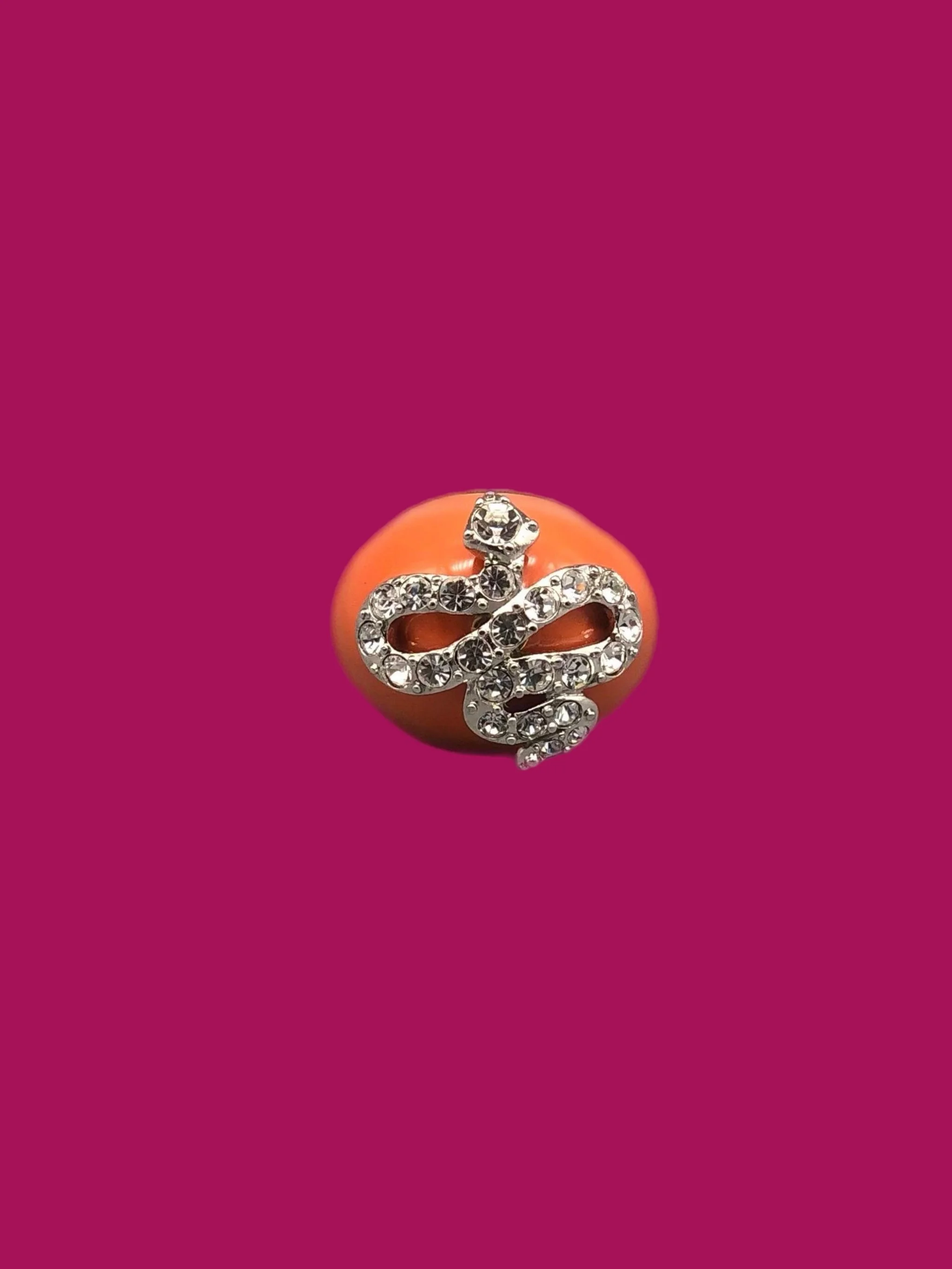 Kenneth Jay Lane costume jewelry ring with coral-effect resin and crystal snake detail, gold-tone ring, Crepundia Gioielli Bologna