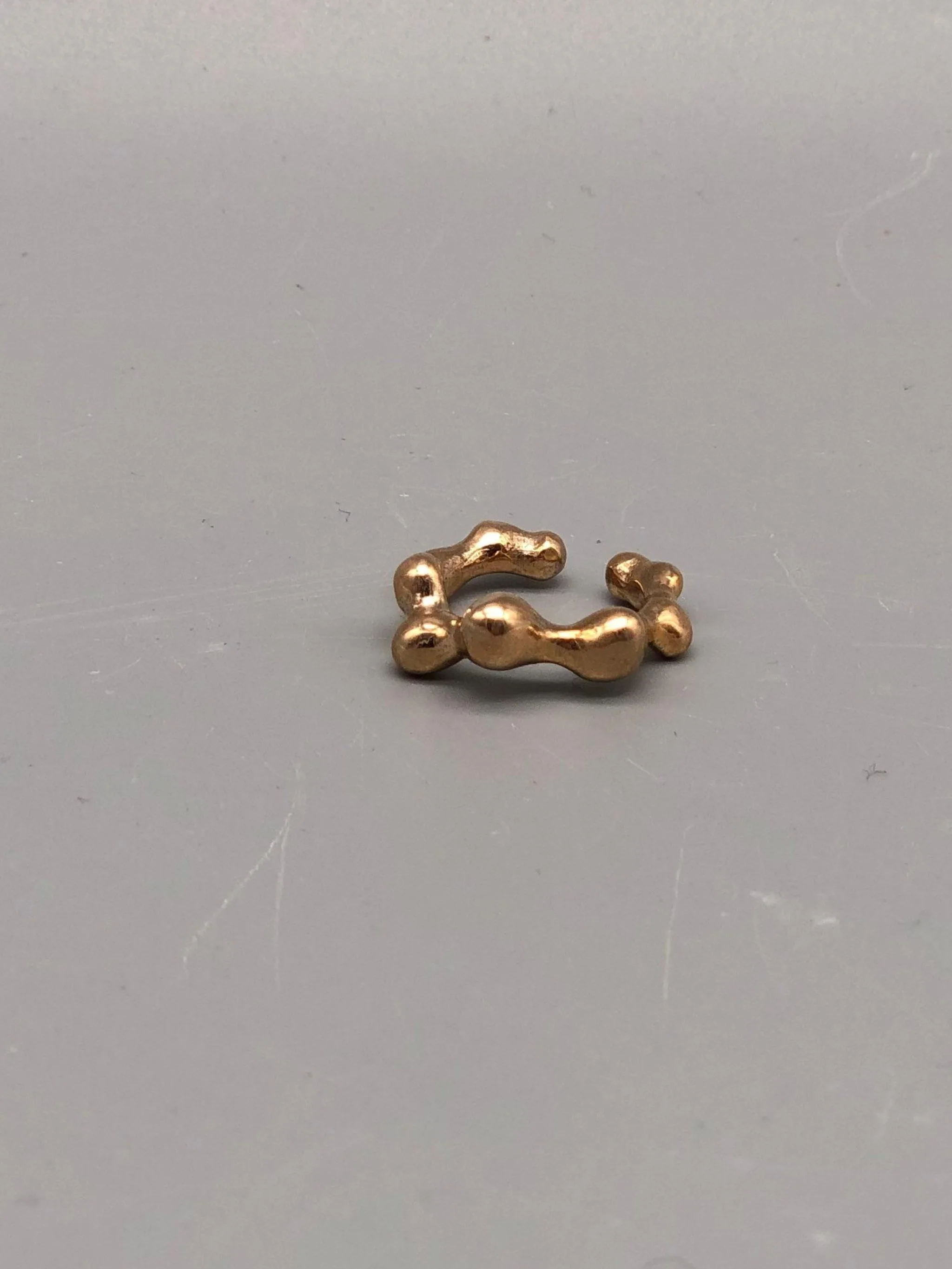Earcuff artigianali in bronzo e argento di Floret Gioielli.