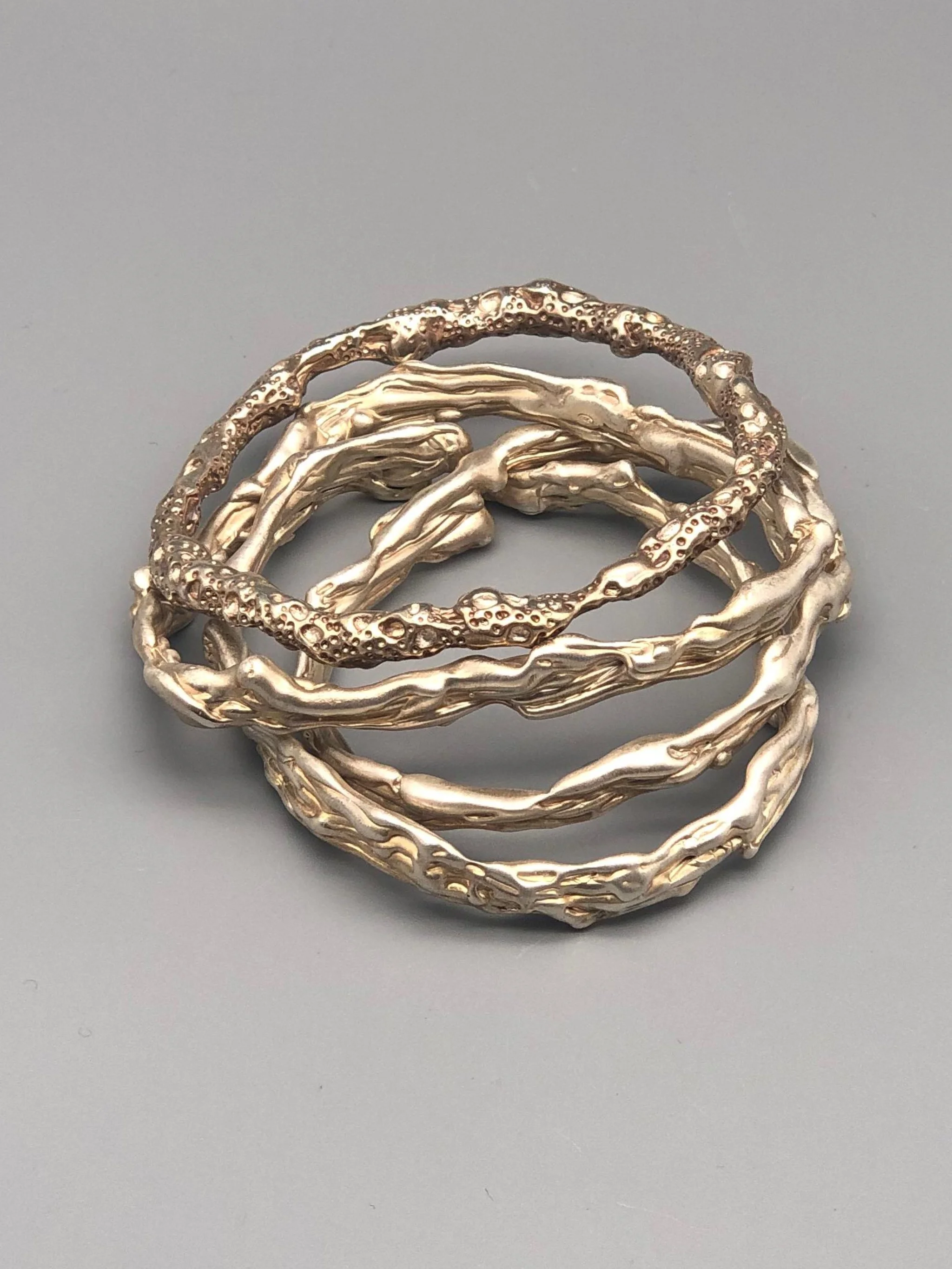 textured silver lunar surface bracelet Portas Jewels — Crepundia Bologna contemporary jewelry