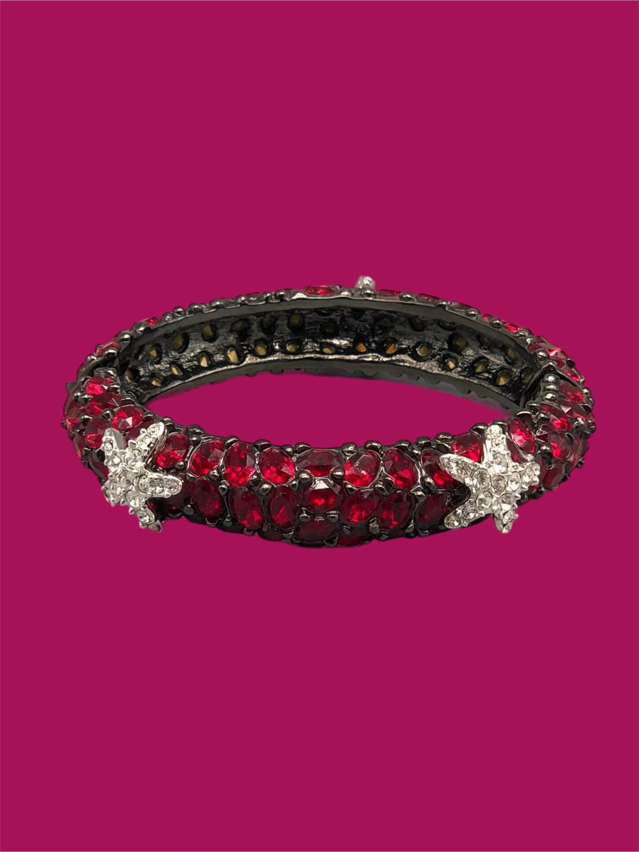 Kenneth Jay Lane costume jewelry bracelet with red crystals and starfish details, gold-tone rigid bracelet, Crepundia Gioielli Bologna
