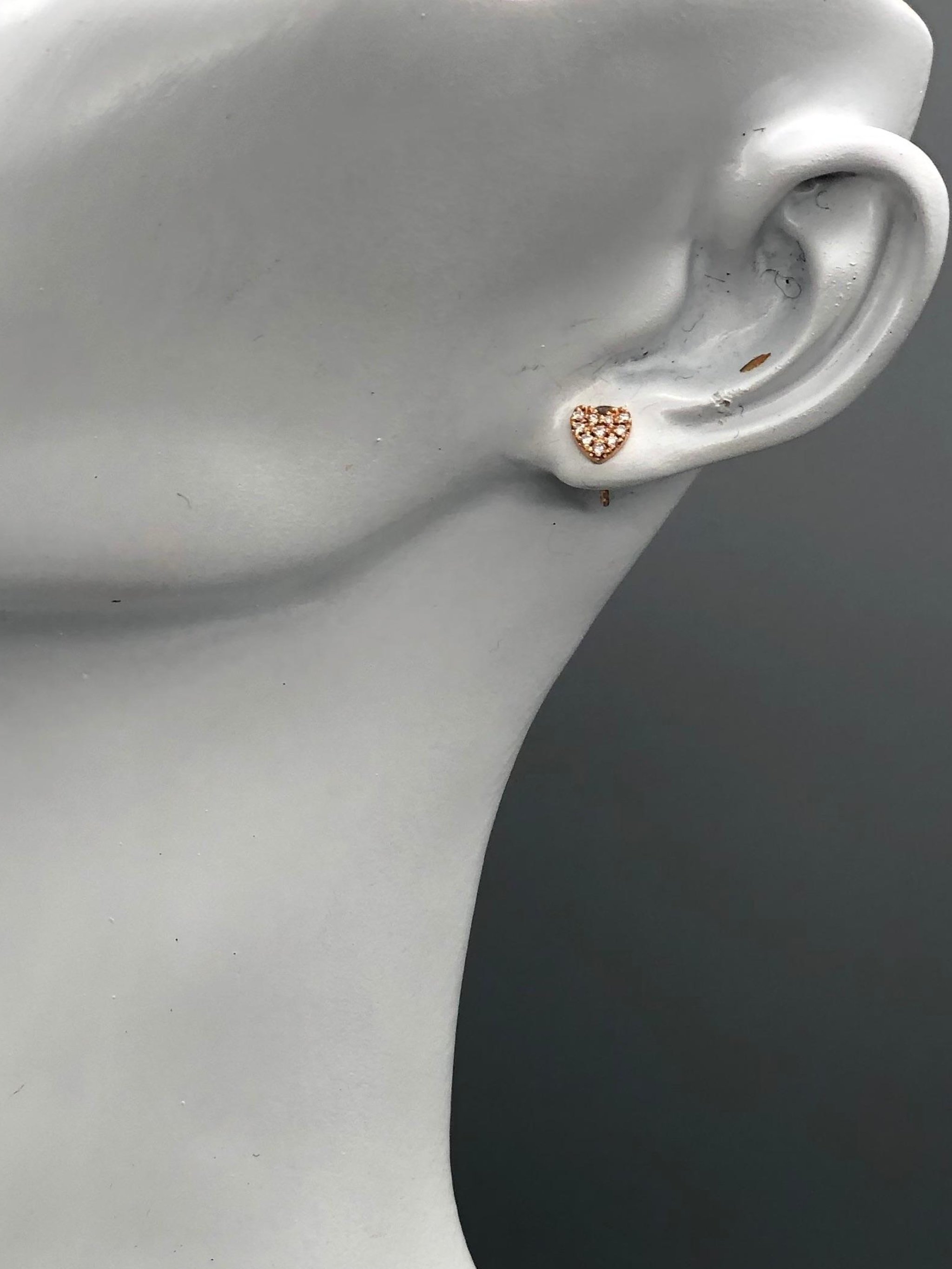 Crepundia Tiny Hearts earrings in rose gold with diamond pavé, small hearts with an essential shape.