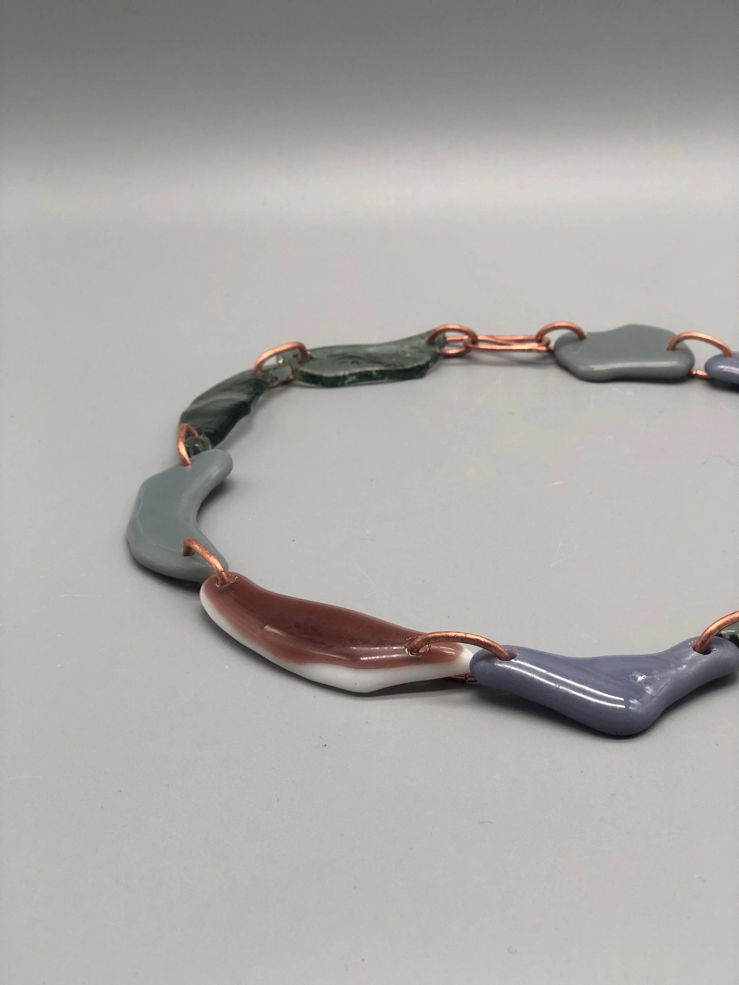 Manumara Murano glass and copper necklace for Crepundia Gioielli Bologna. / Collana Manumara in vetro Murano e rame per Crepundia Gioielli Bologna.