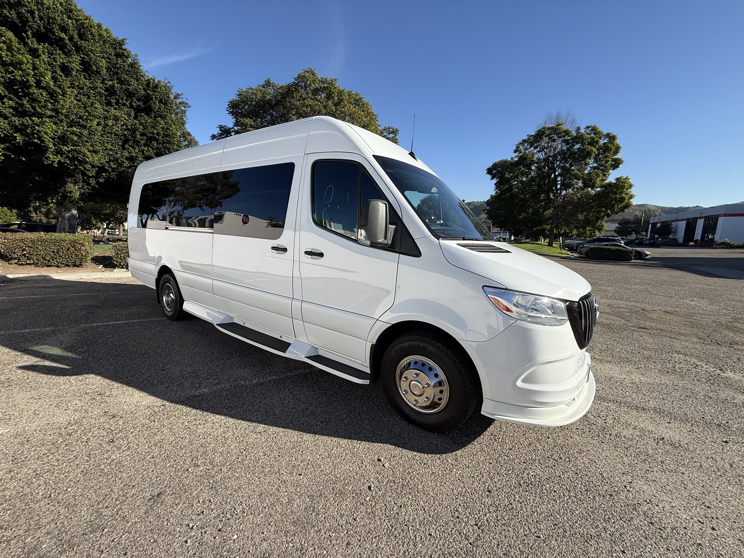 white sprinter limo naninas wedding