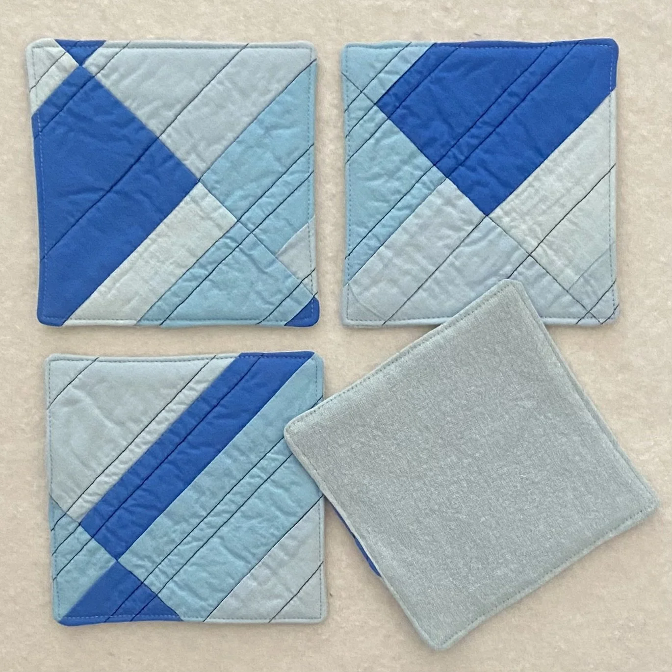 set of four coasters ($40)