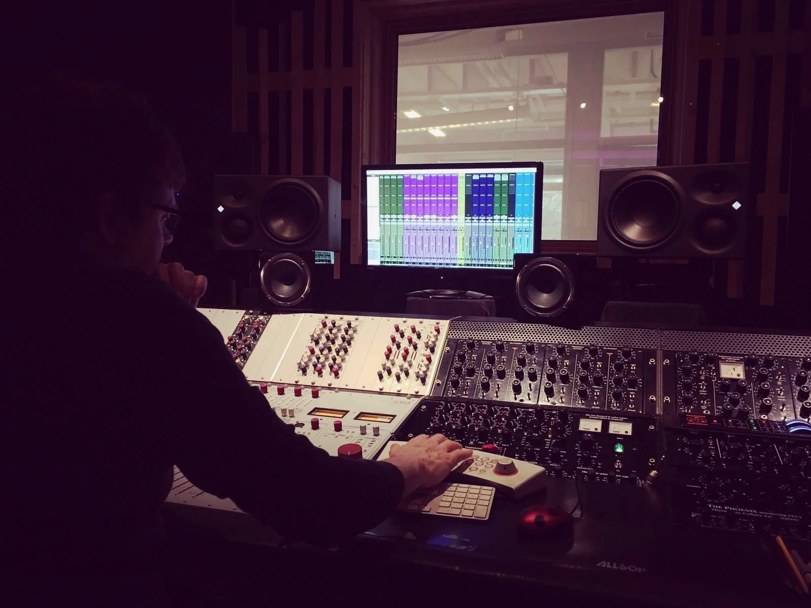 me at dark desk.jpeg