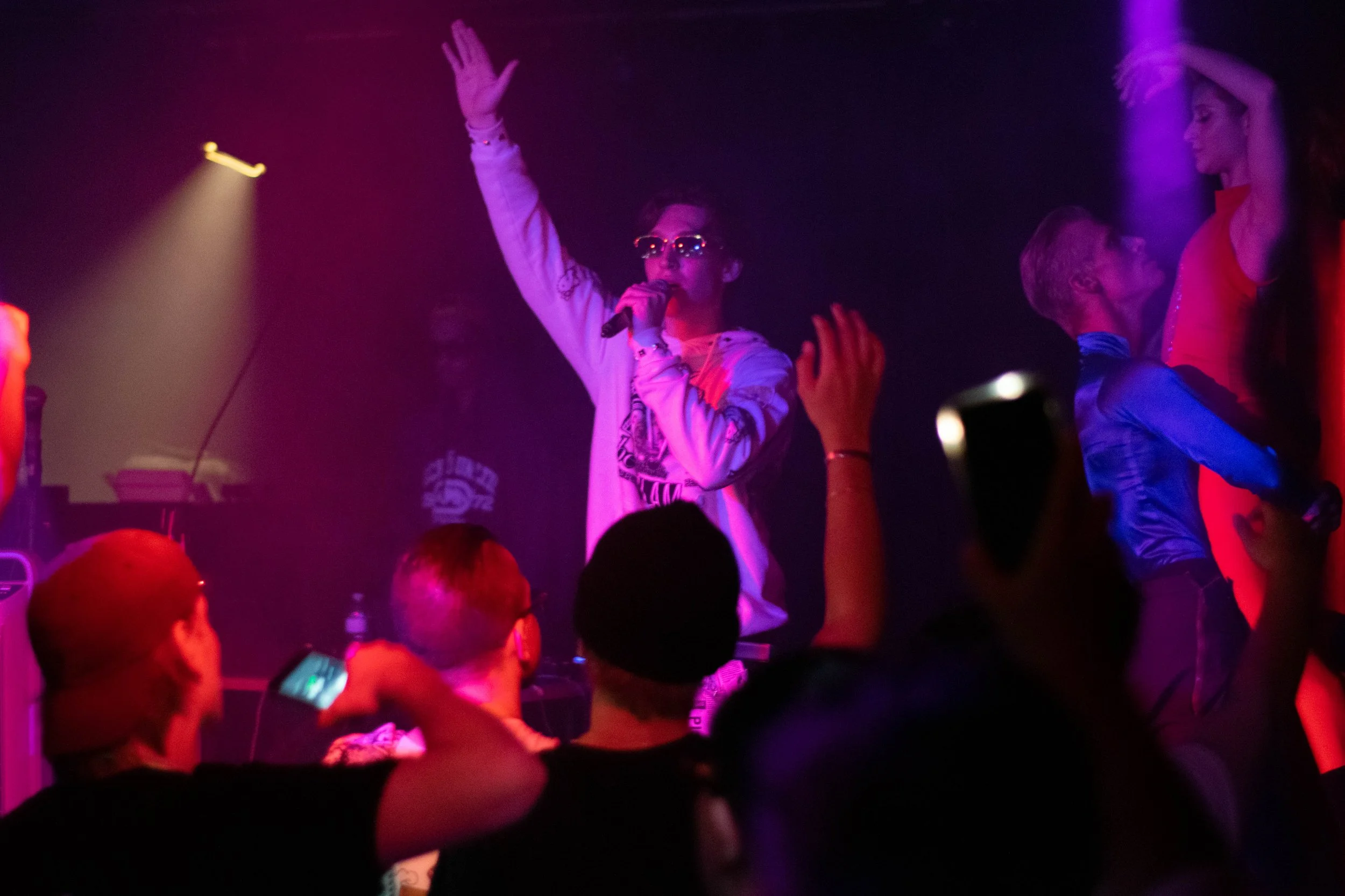 8ond above crowd hand sway with dancer red light_.jpg