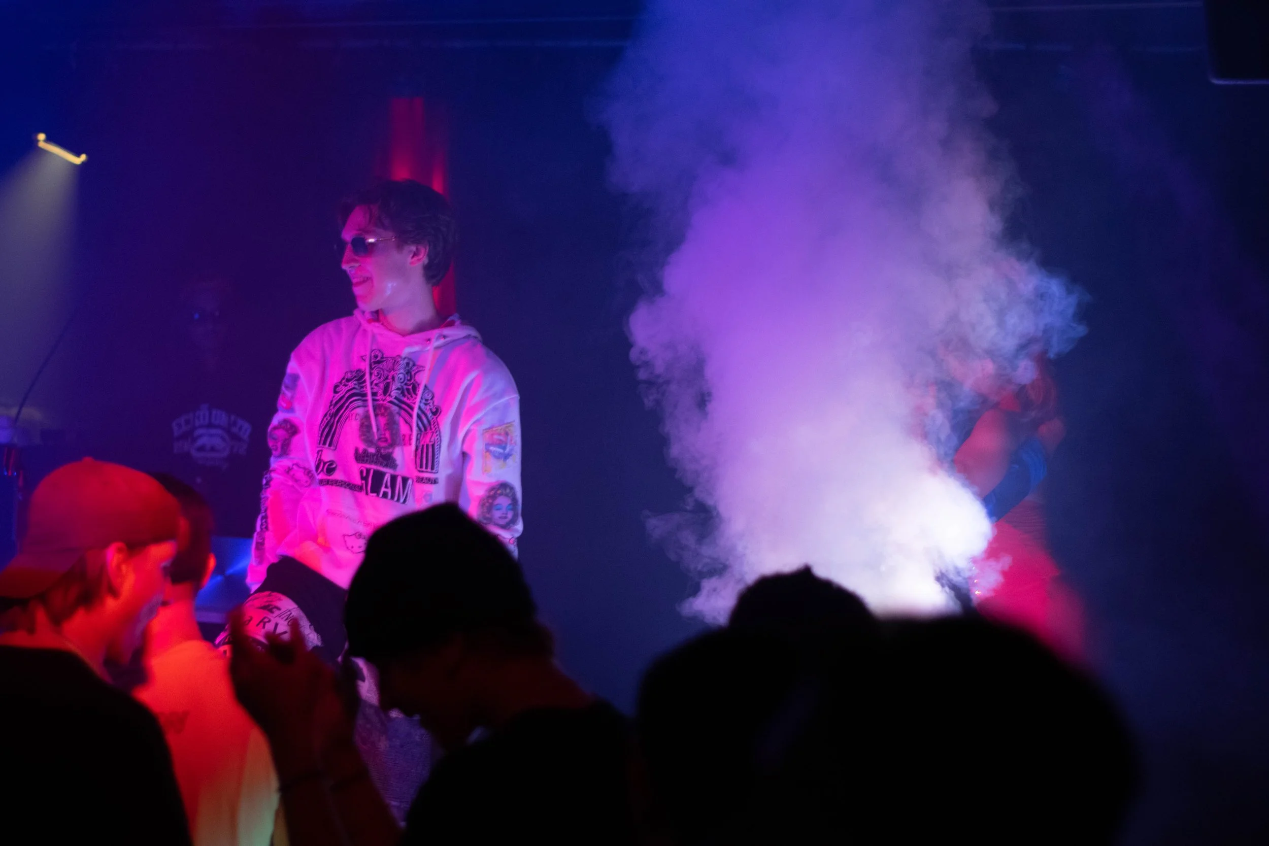 8ond above crowd smoke plume red light_.jpg