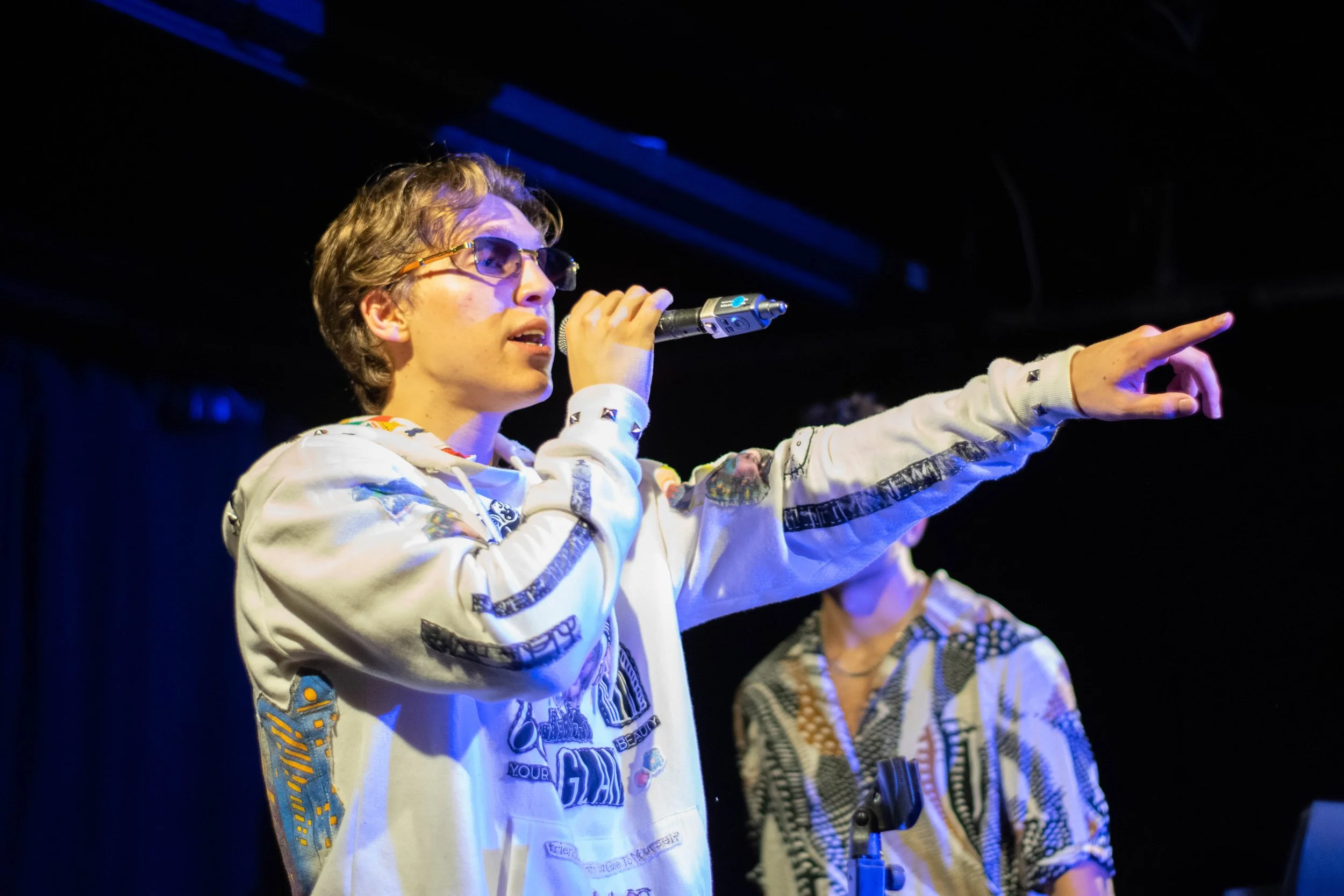 8ond tovi pointing at crowd white light.jpg