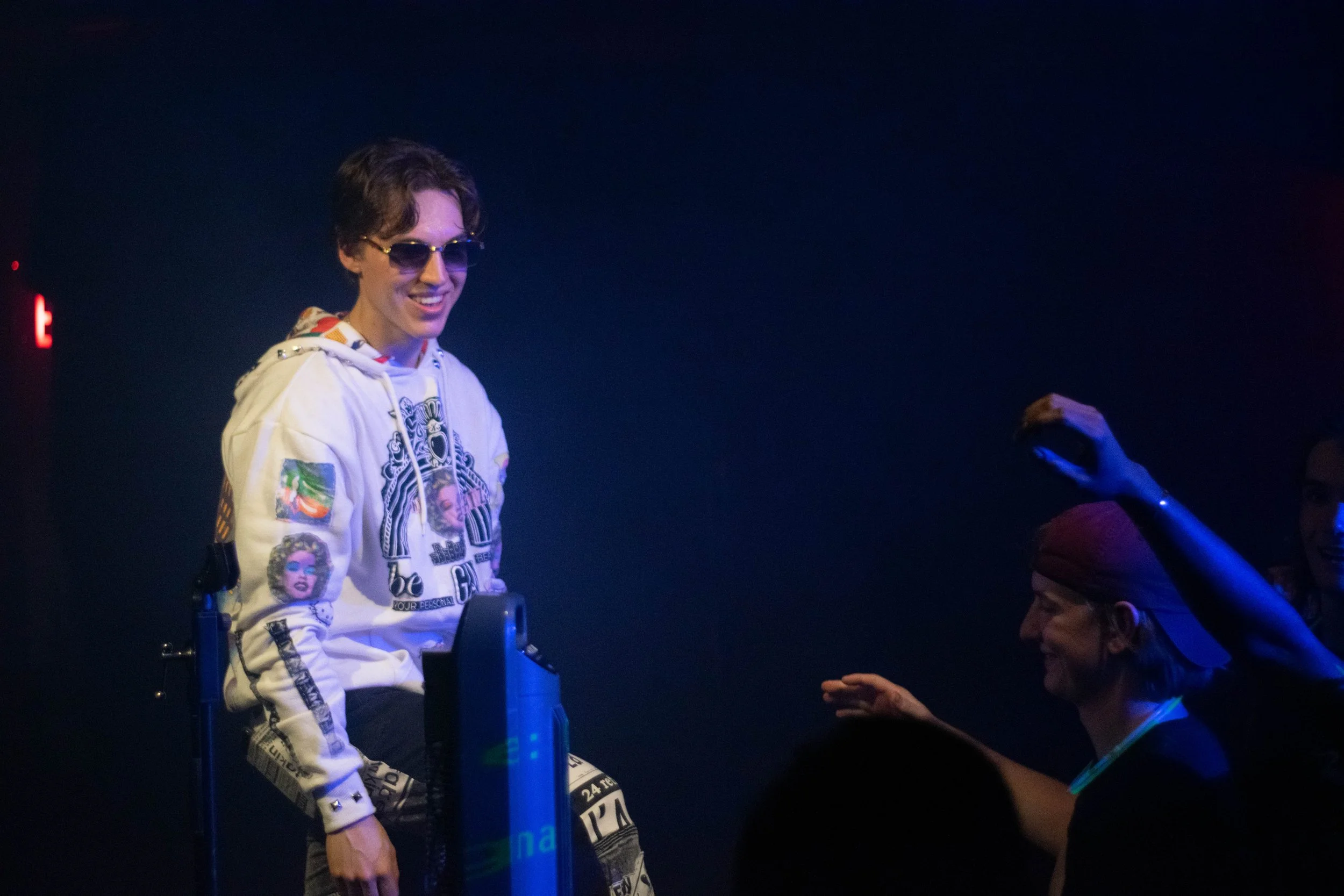 8ond above crowd smile glow white light.jpg