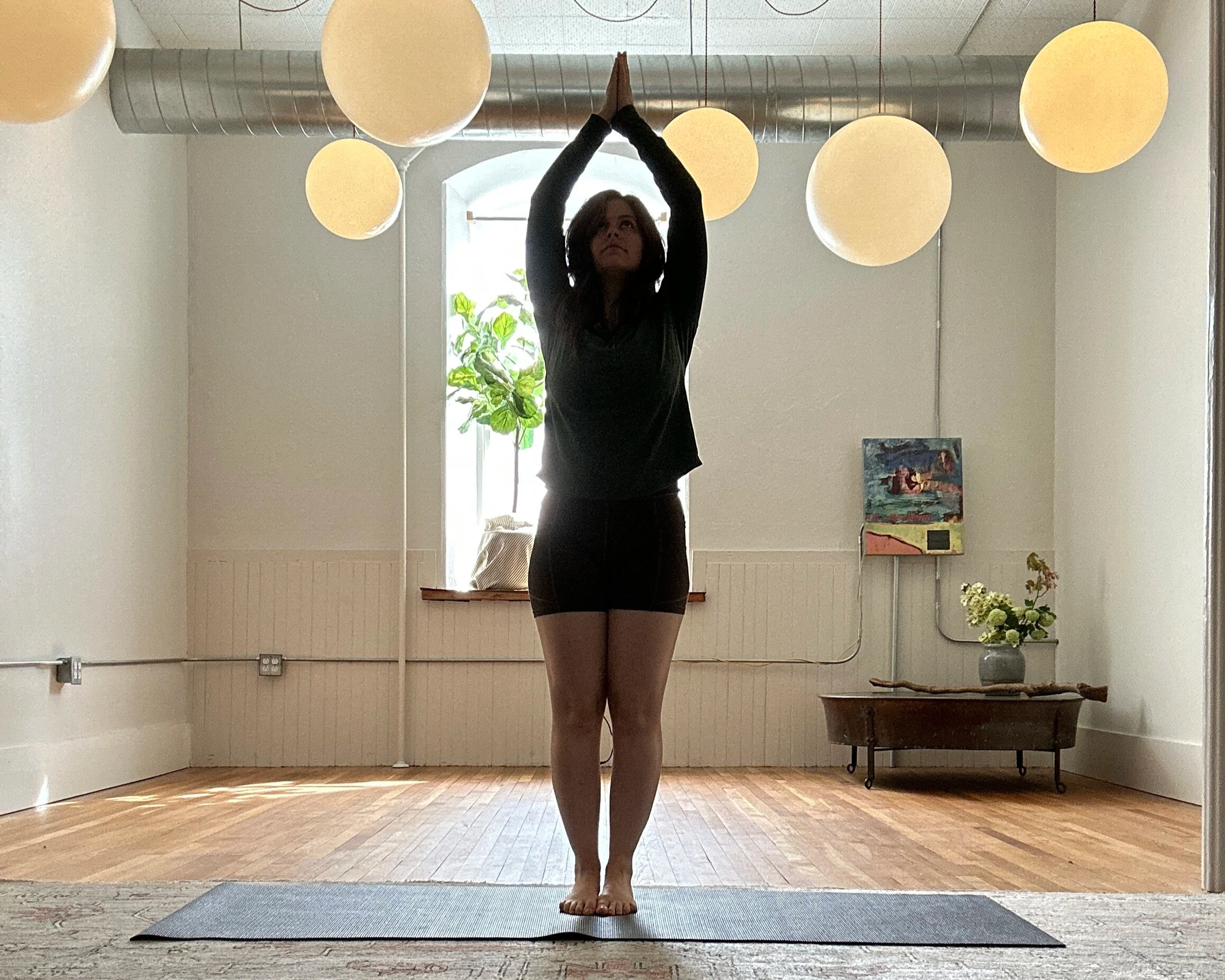 Person doing yoga at 3580 in East Falls Philadelphia