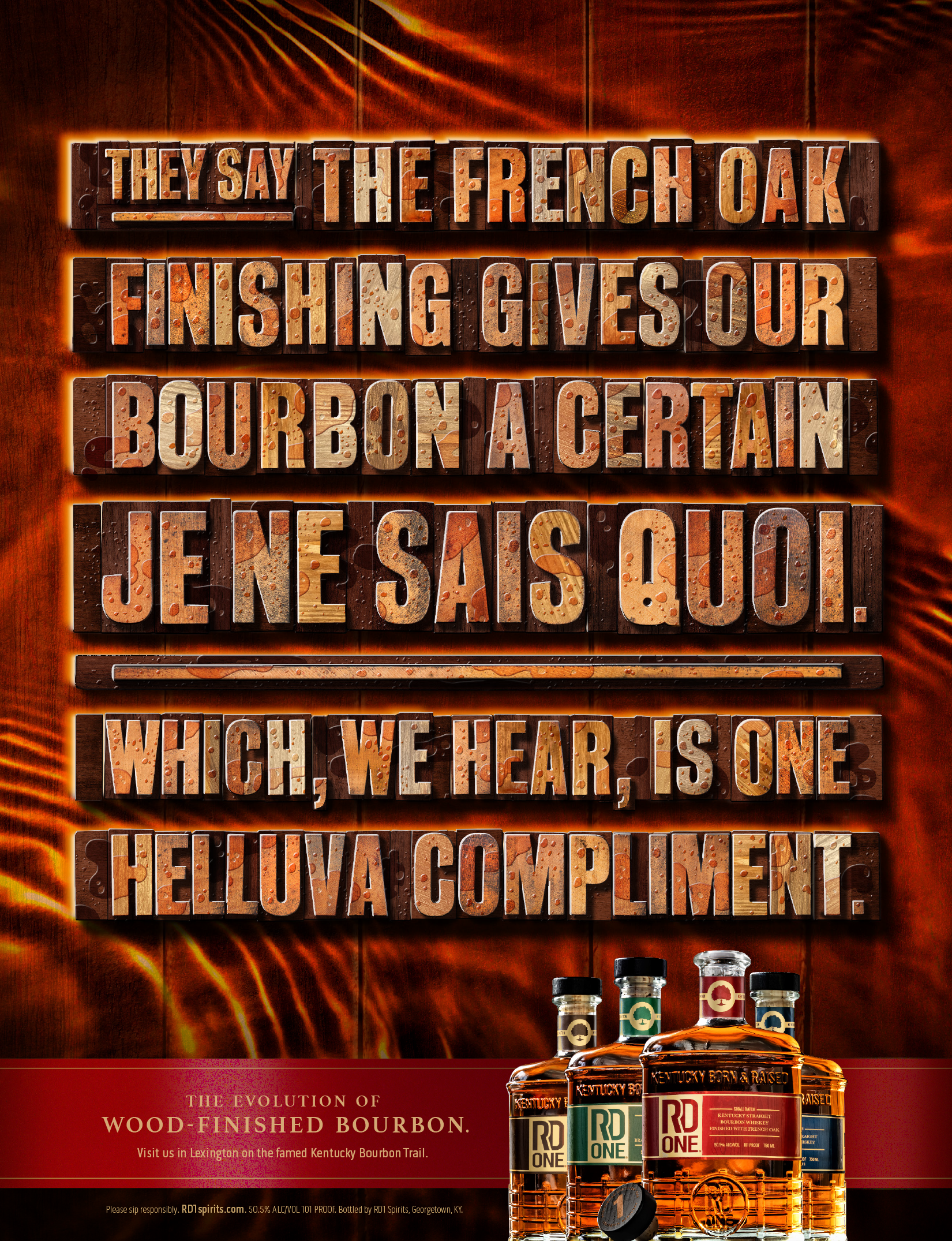 Full page print ad featuring a wooden barrel background, wood block letters, and a headline that reads, "They say the French oak finishing gives our bourbon a certain je ne sais quoi. Which, we hear, is one helluva compliment."