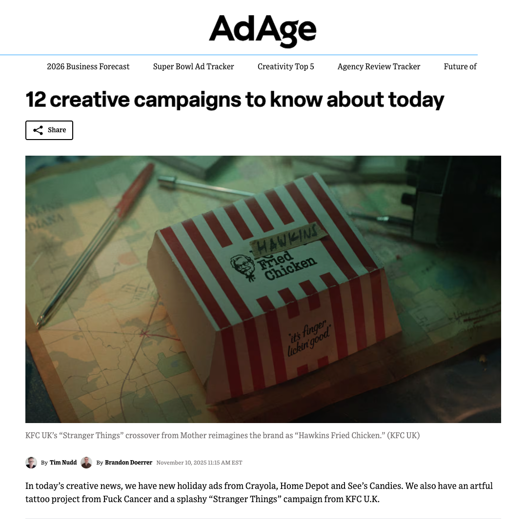 KFC fried chicken in a red and white striped box on a map, with pens nearby.