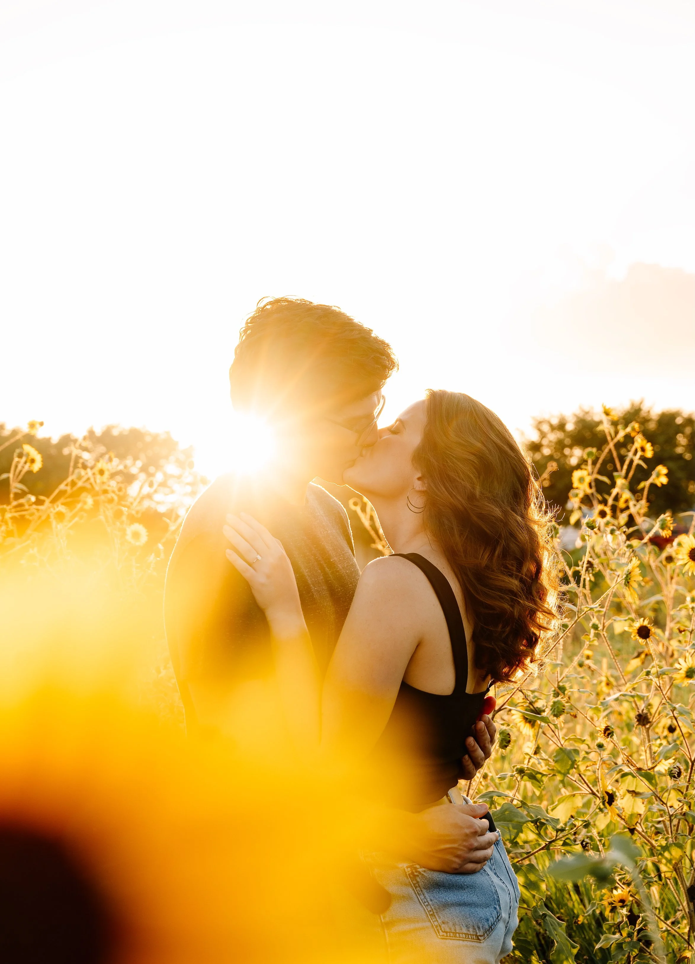 Photos by Mkay Engagement Photography Couple in the Sun Flower Field